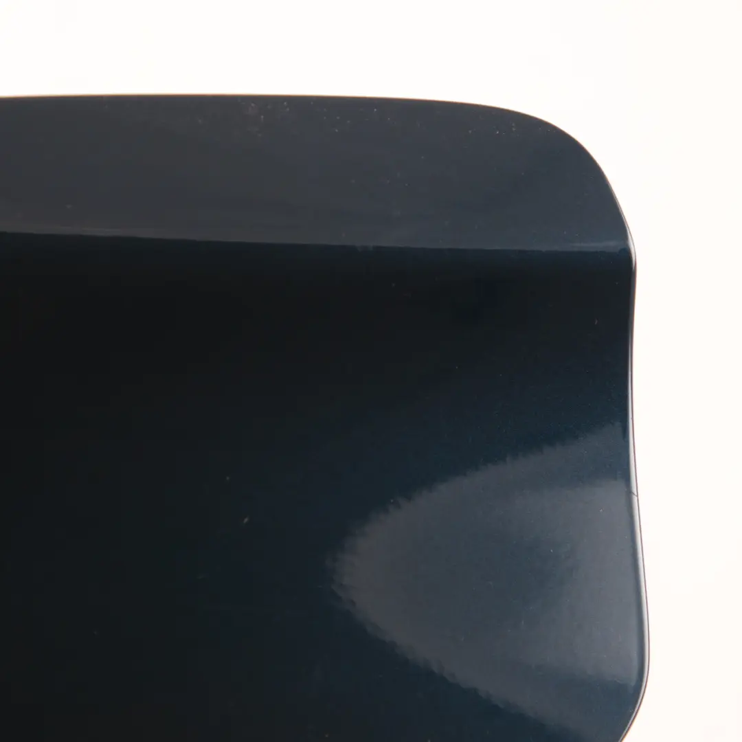 Panel de la tapa de la tapa de combustible Midnight Blue Metallic B38 para BMW X1 E84 con número de pieza 2993153 BMW X1 E84 Panel de la tapa de la tapa de combustible Midnight Blue Metallic B38 - SKU 2993153-MBM - Número de pieza 2993153