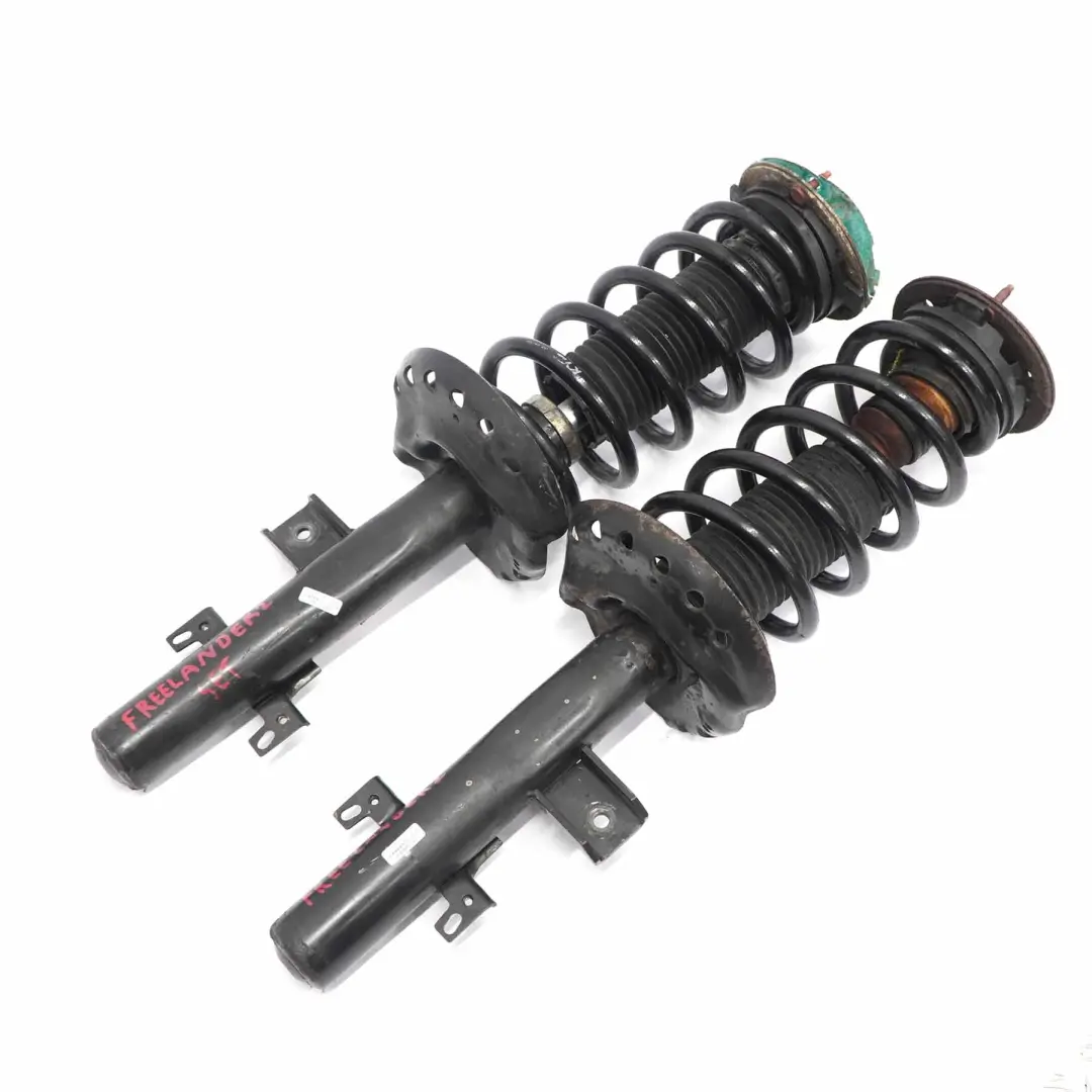 Land Rover Freelander 2 Juego KYB Amortiguador Trasero Izquierdo Derecho Muelle - SKU 335831 - Número de pieza 335831