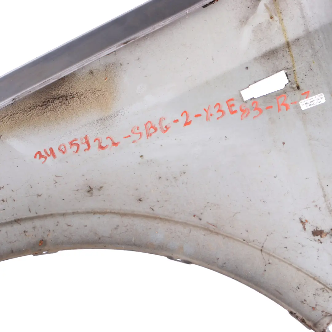 Błotnik Prawy Przód Silbergrau do BMW X3 E83 o numerze 3405922 BMW X3 E83 Błotnik Prawy Przód Silbergrau - SKU 3405922-SBG2 - Numer Części 3405922