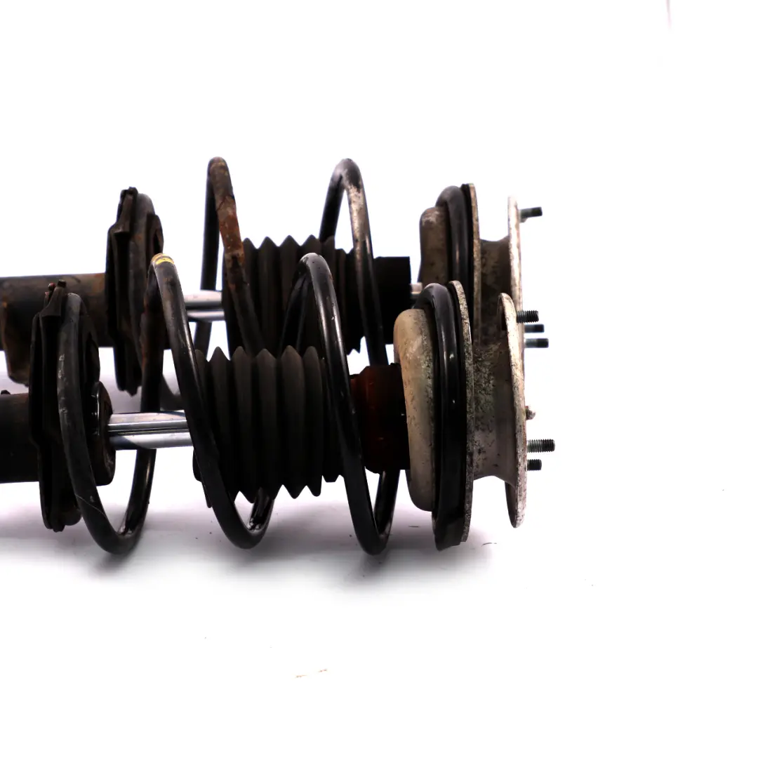 Sachs Front Left Right N/O/S Shock Absorber Spring Strut Set to BMW 3 E46 with Part number 556868 BMW 3 E46 Sachs Front Left Right N/O/S Shock Absorber Spring Strut Set - SKU 556868 - Part number 556868
