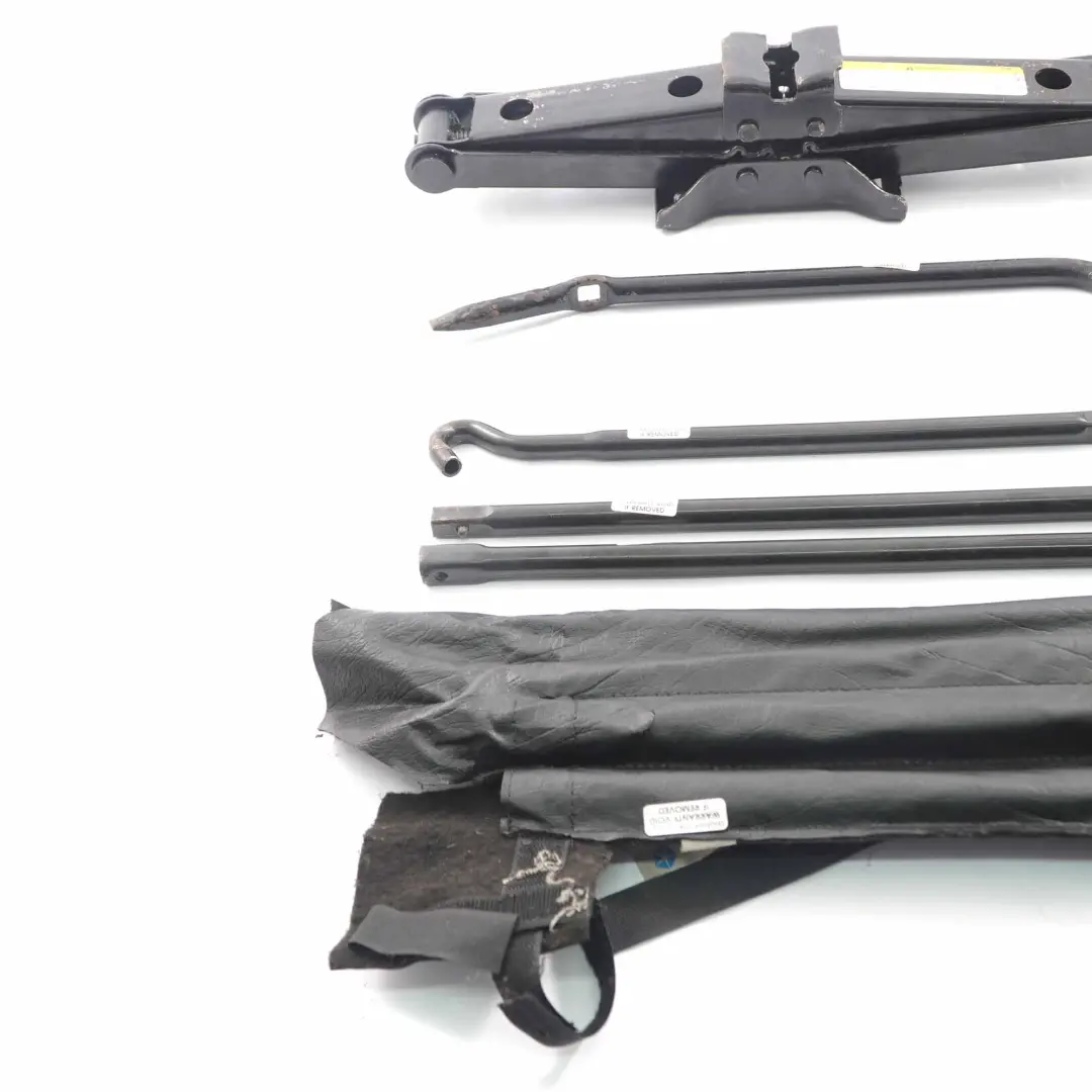 Kit herramientas almacenamiento tuerca Rueda elevación Jack para Jeep Commander con número de pieza 56052848AA Jeep Commander Kit herramientas almacenamiento tuerca Rueda elevación Jack - SKU 56052848AA - Número de pieza 56052848AA