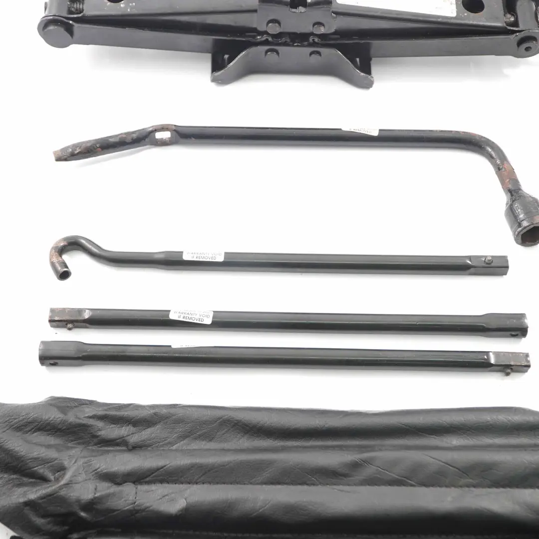 Kit herramientas almacenamiento tuerca Rueda elevación Jack para Jeep Commander con número de pieza 56052848AA Jeep Commander Kit herramientas almacenamiento tuerca Rueda elevación Jack - SKU 56052848AA - Número de pieza 56052848AA