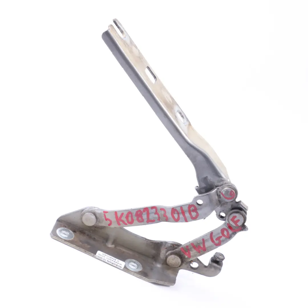 MK6 Cerniera cofano anteriore sinistra grigio unito - LA7T per VW Golf con numero di parte 5K0823301B VW Golf MK6 Cerniera cofano anteriore sinistra grigio unito - LA7T - SKU 5K0823301B-UGR - Numero di parte 5K0823301B