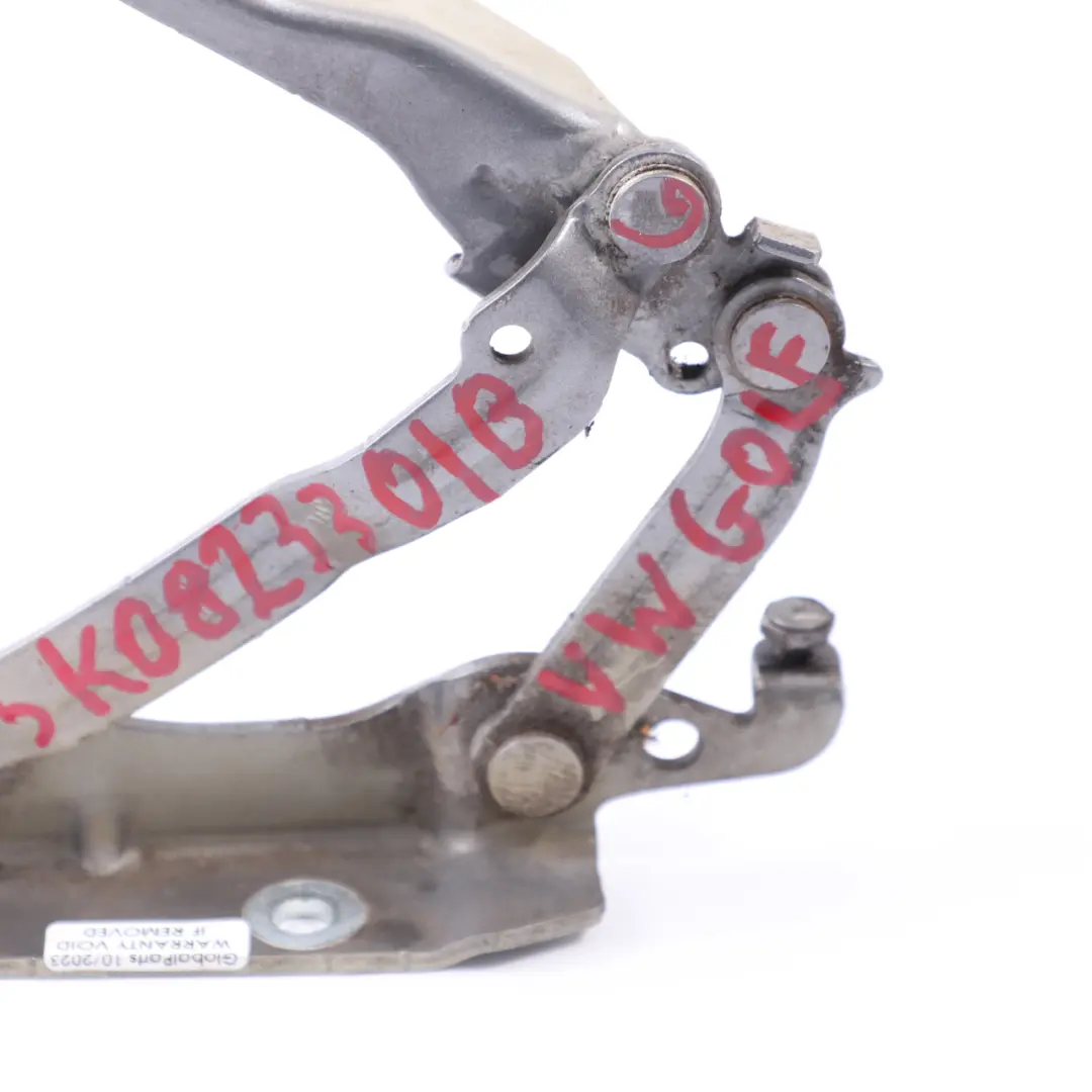 MK6 Cerniera cofano anteriore sinistra grigio unito - LA7T per VW Golf con numero di parte 5K0823301B VW Golf MK6 Cerniera cofano anteriore sinistra grigio unito - LA7T - SKU 5K0823301B-UGR - Numero di parte 5K0823301B