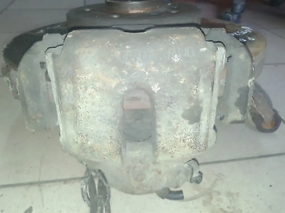 Complete Front Right Brake Disc Caliper Housing Carrier O/S to BMW X5 Series E53 with Part number 31216761576 BMW X5 Series E53 Complete Front Right Brake Disc Caliper Housing Carrier O/S - SKU 6761576 - Part number 31216761576