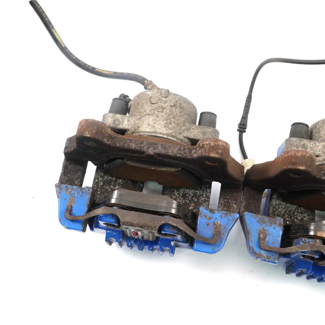 BMW E90 E92 Brake Caliper Front Left Right N/O/S Carrier Housing Set 57/24/330 - SKU 6769093/6769094 - Part number 6769093