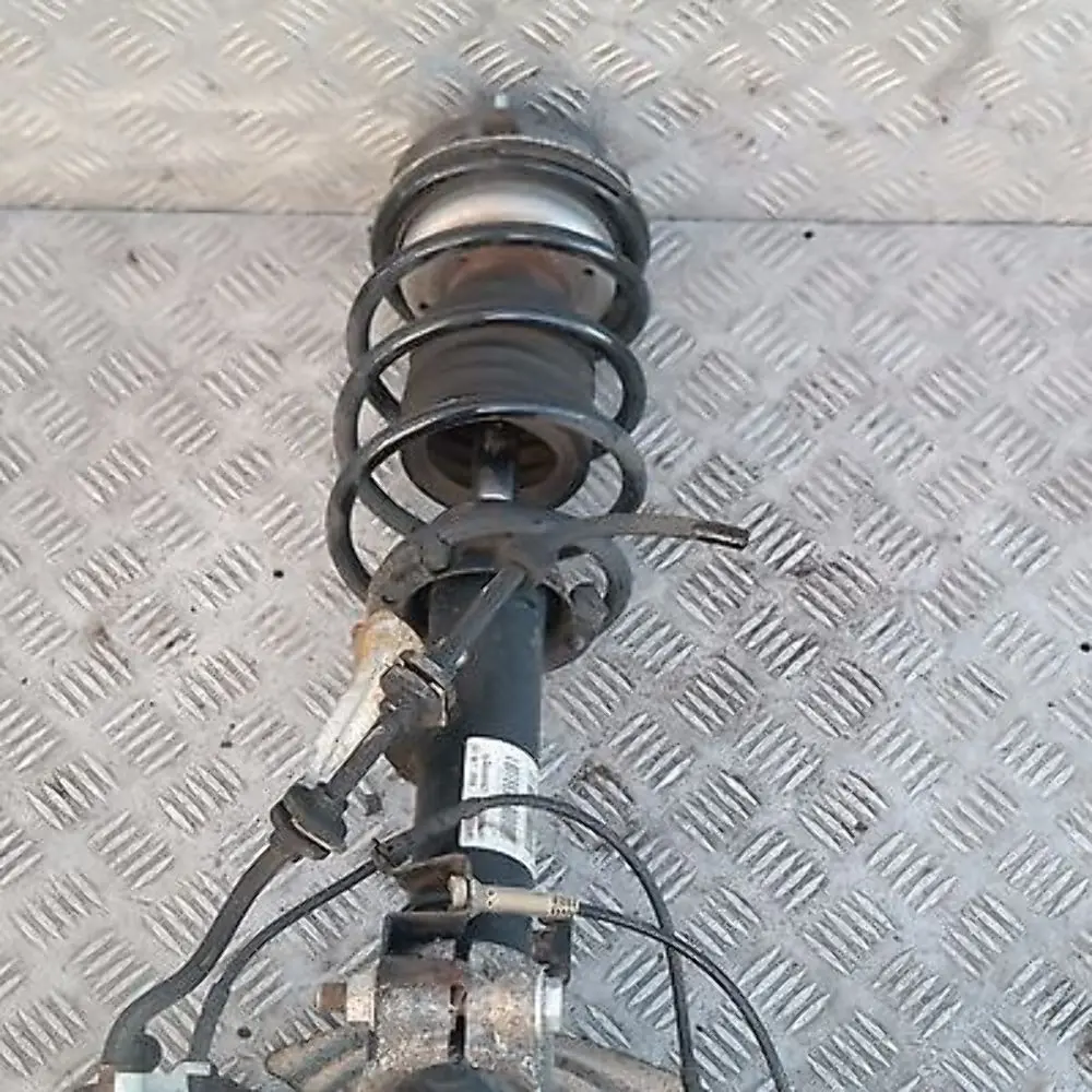 N53 Amortyzator zwrotnica lewa do BMW E90 325i o numerze 31306771177 BMW E90 325i N53 Amortyzator zwrotnica lewa - SKU 6771177 - Numer Części 31306771177