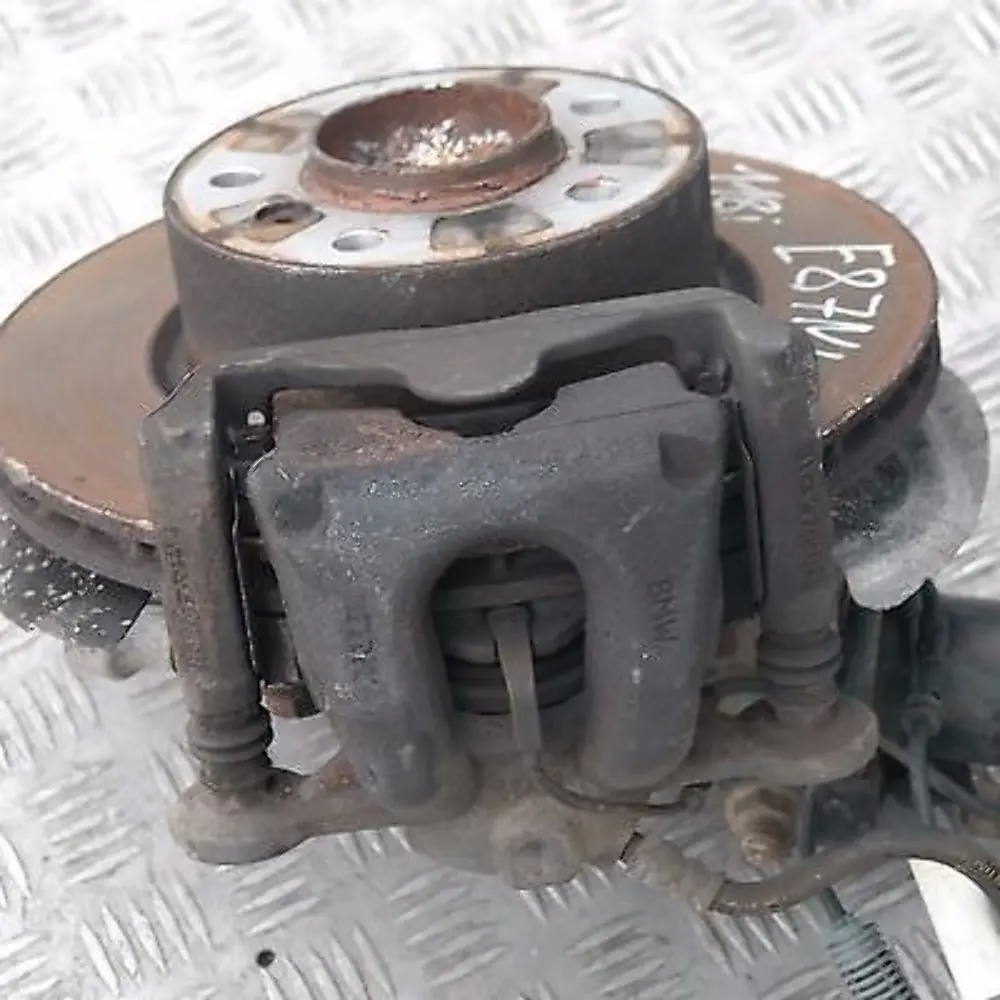 BMW 1 er E87 LCI 118i Vorne Links Stoßdämpfer Federbein Bremsscheibe Radlager - SKU 6771553-2 - Teilenummer 31316771553