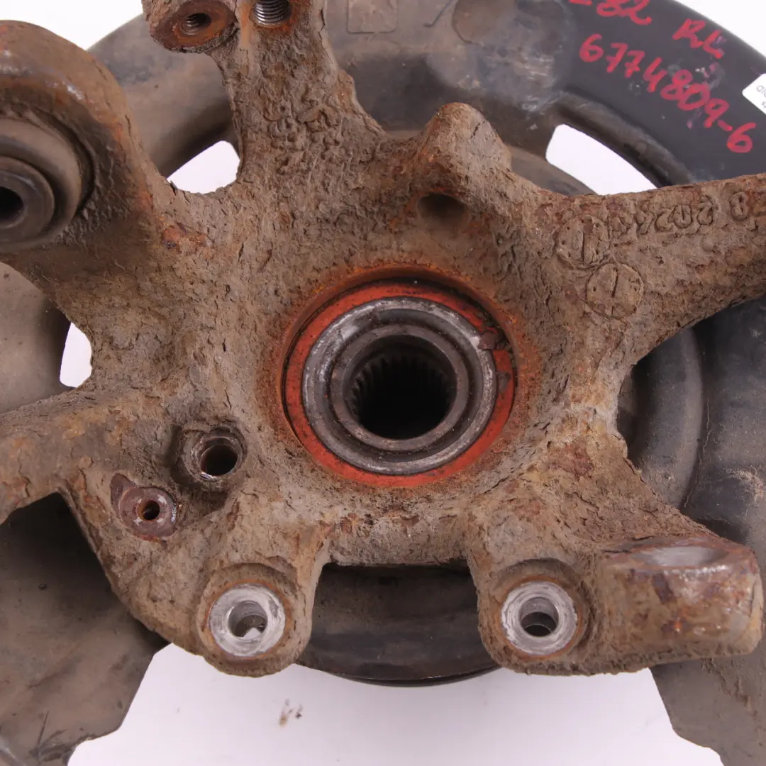 Zwrotnica Piasta Lewa Lewy Tył do BMW E82 E88 o numerze 6774809 BMW E82 E88 Zwrotnica Piasta Lewa Lewy Tył - SKU 6774809-6 - Numer Części 6774809