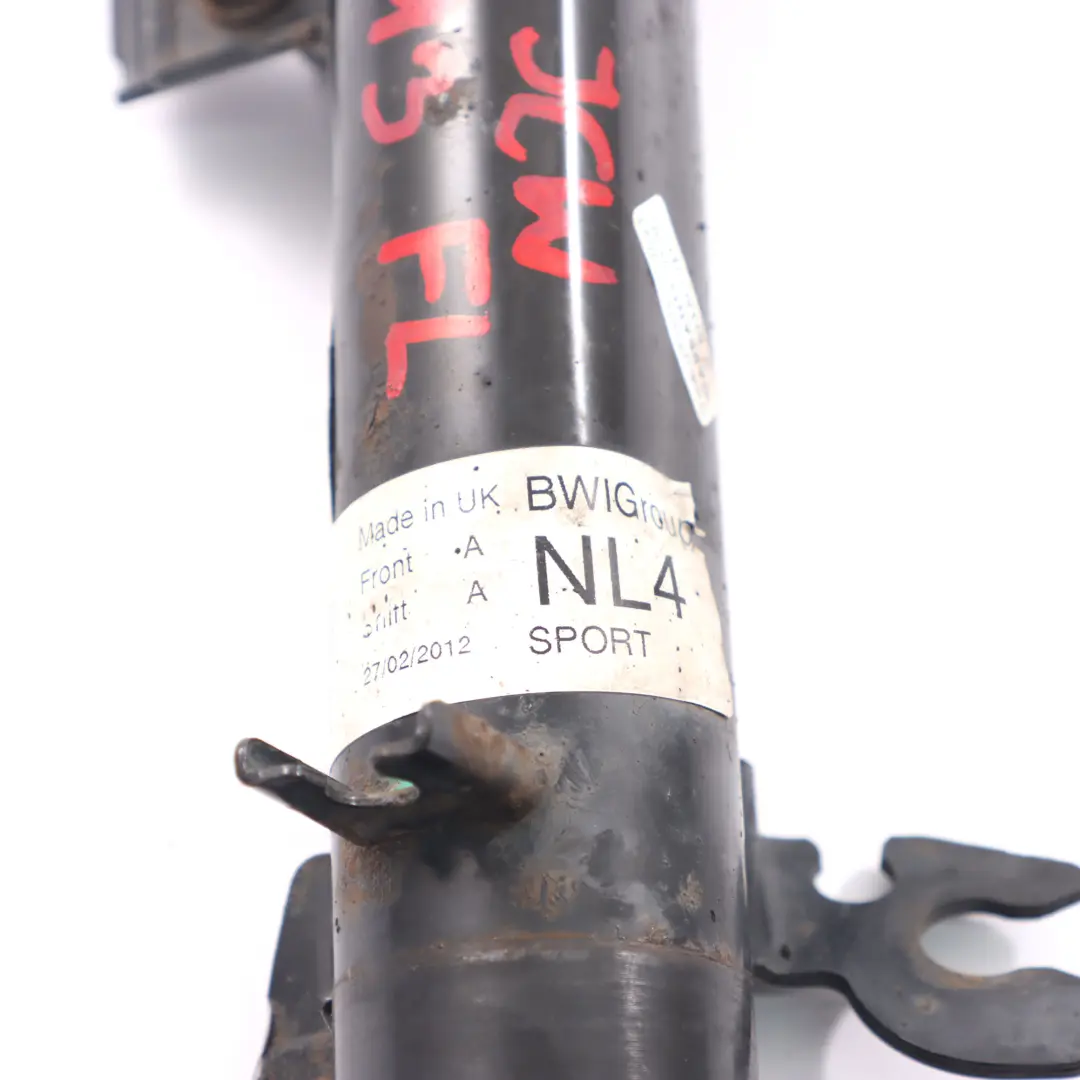 Amortiguador Delantero Izquierdo Muelle Strut para Mini Cooper S JCW R56 N14 con número de pieza 6785213 Mini Cooper S JCW R56 N14 Amortiguador Delantero Izquierdo Muelle Strut - SKU 6785213 - Número de pieza 6785213