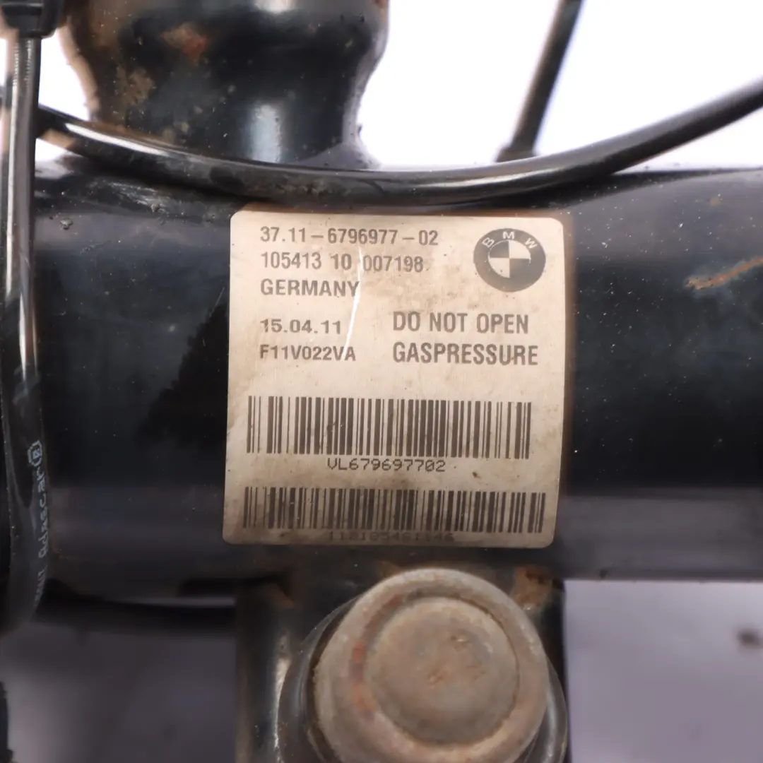 Strut BMW F11 Front Left N/S EDC Suspension Shock Absorber to Spring with Part number 6796977 Spring Strut BMW F11 Front Left N/S EDC Suspension Shock Absorber - SKU 6796977 - Part number 6796977