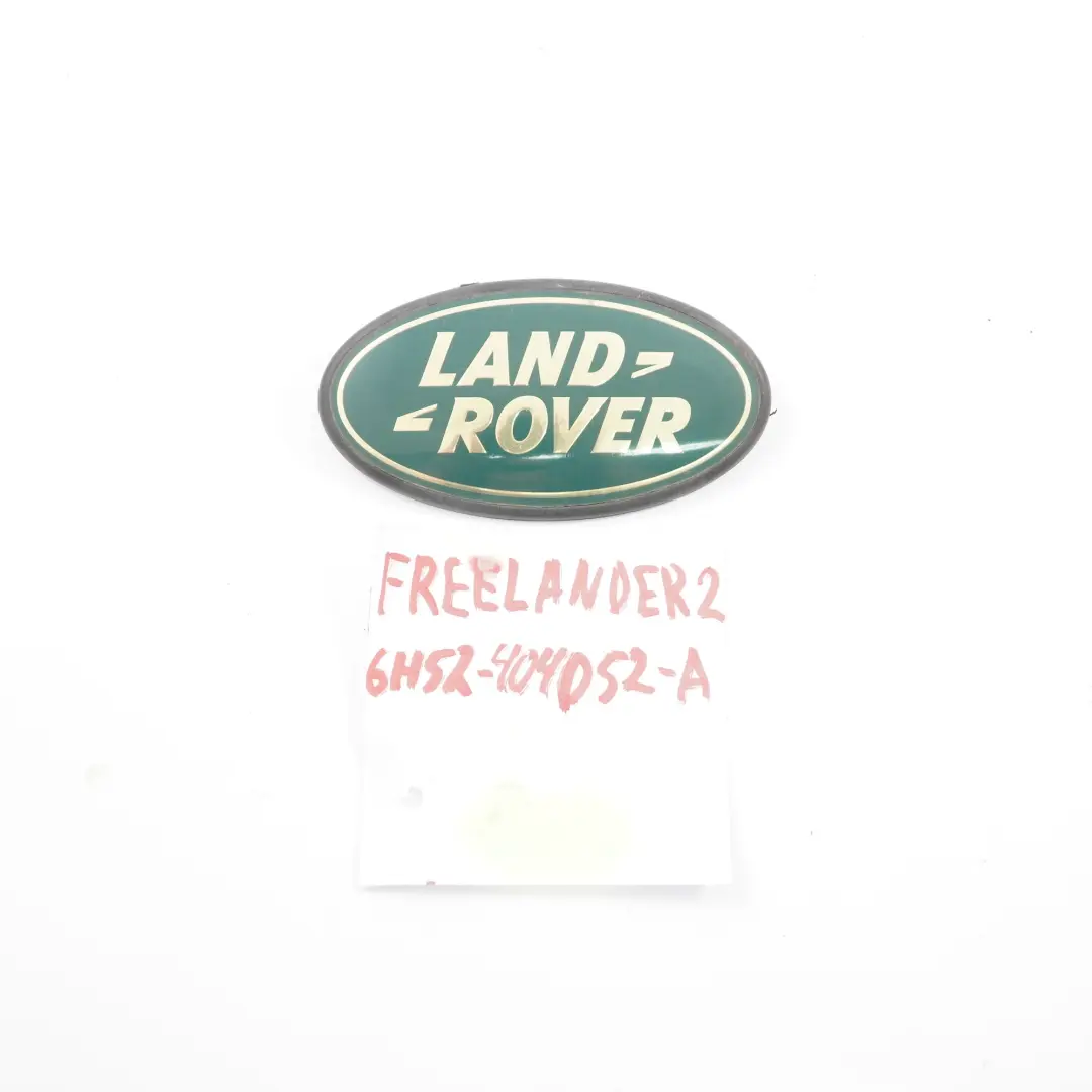 Emblemat Grill Logo Przód do Land Rover Freelander 2 o numerze 6H52-404D52-A Land Rover Freelander 2 Emblemat Grill Logo Przód - SKU 6H52-404D52-A - Numer Części 6H52-404D52-A