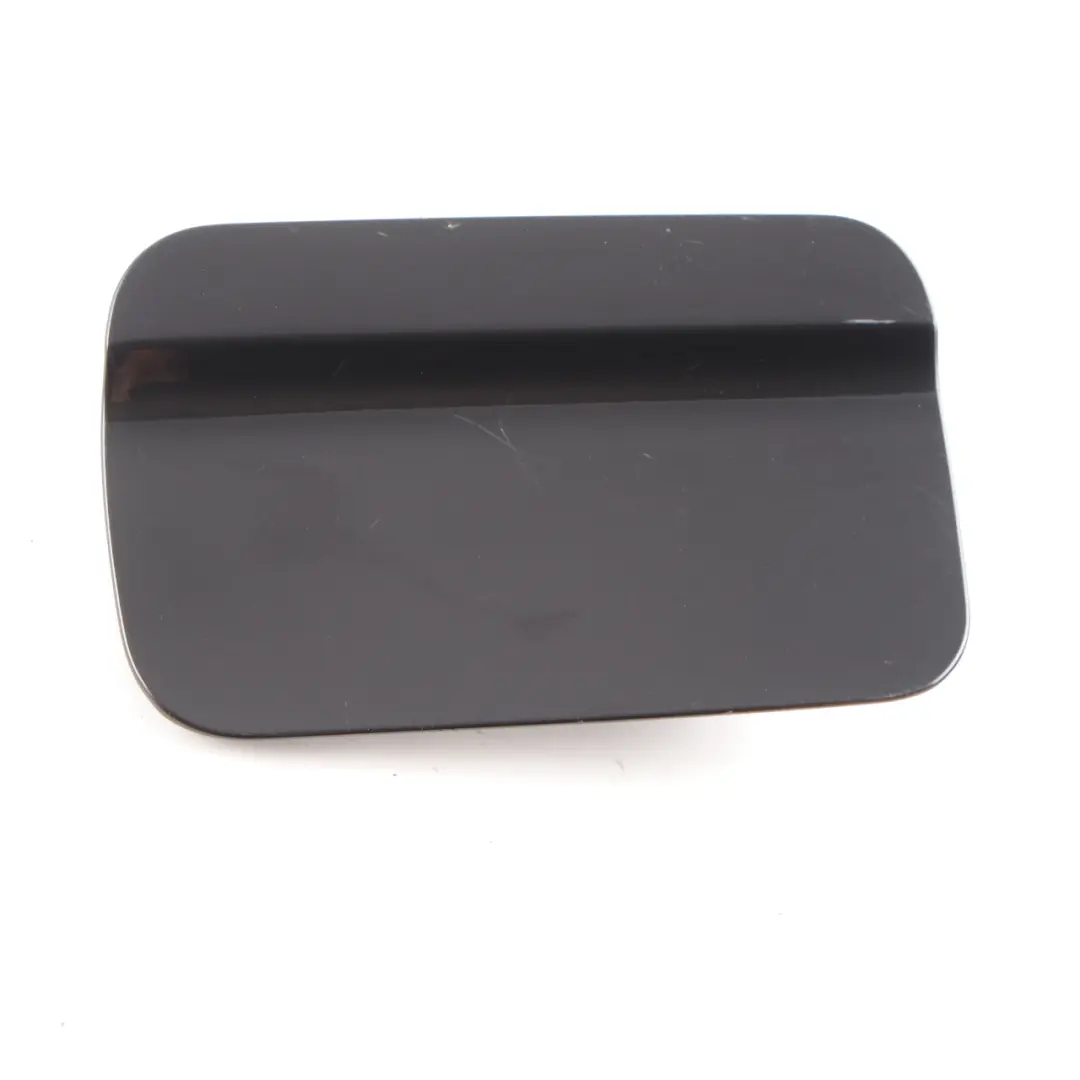 Fill In Flap Fuel Cover Trim Panel Black Sapphire Metallic to BMW X5 E53 with Part number 7001027 BMW X5 E53 Fill In Flap Fuel Cover Trim Panel Black Sapphire Metallic - SKU 7001027-BS2 - Part number 7001027