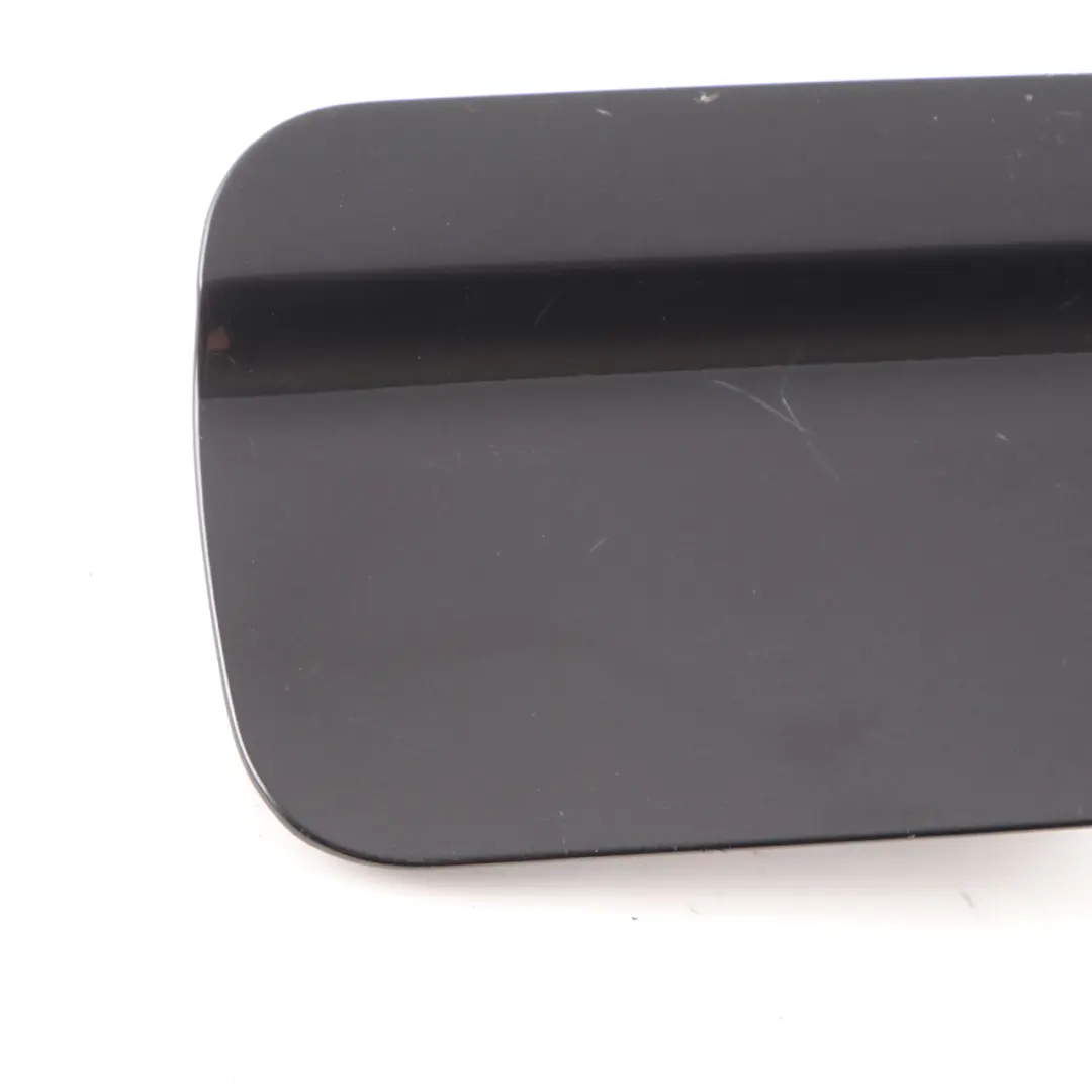Fill In Flap Fuel Cover Trim Panel Black Sapphire Metallic to BMW X5 E53 with Part number 7001027 BMW X5 E53 Fill In Flap Fuel Cover Trim Panel Black Sapphire Metallic - SKU 7001027-BS2 - Part number 7001027
