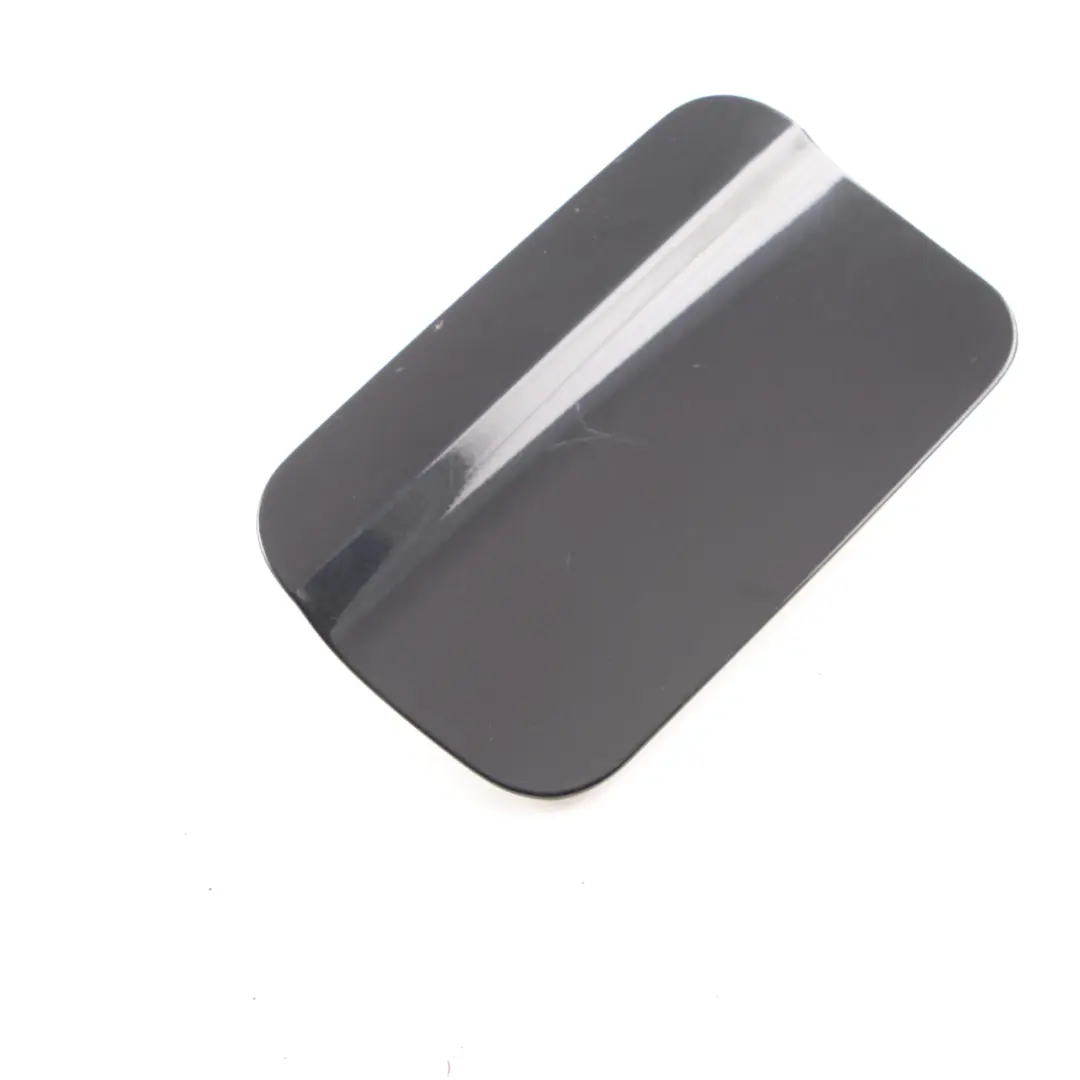 Fill In Flap Fuel Cover Trim Panel Black Sapphire Metallic to BMW X5 E53 with Part number 7001027 BMW X5 E53 Fill In Flap Fuel Cover Trim Panel Black Sapphire Metallic - SKU 7001027-BS2 - Part number 7001027