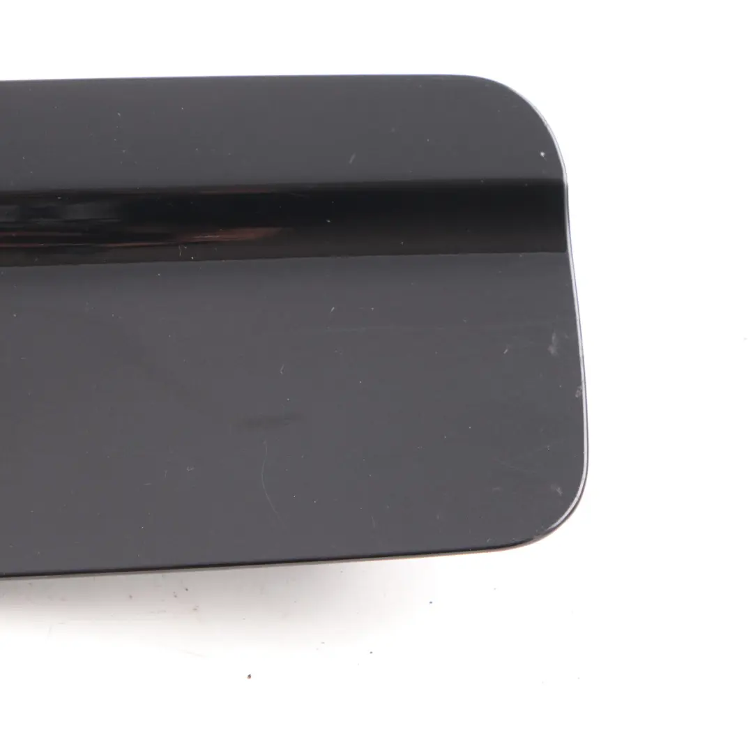 Fill In Flap Fuel Cover Black Sapphire Metallic to BMW X5 Series E53 with Part number 7001027 BMW X5 Series E53 Fill In Flap Fuel Cover Black Sapphire Metallic - SKU 7001027-BS - Part number 7001027