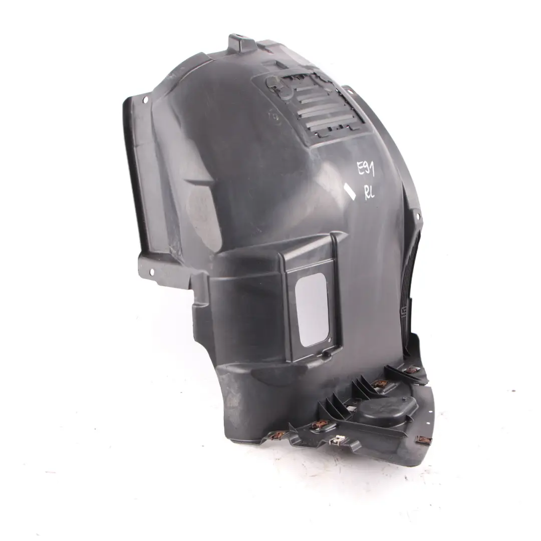 Tapa Paso De Rueda Izquierda Delantera Panel Inferior para BMW E90 E91 con número de pieza 7059379 BMW E90 E91 Tapa Paso De Rueda Izquierda Delantera Panel Inferior - SKU 7059379-2 - Número de pieza 7059379