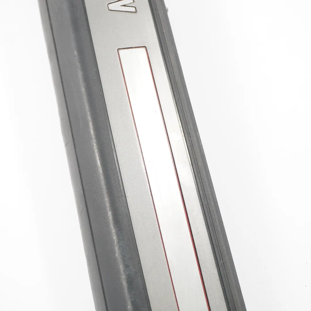 Bande de Protection Droite Entrée Intérieur Titan Dunkel pour BMW E63 E64 à propos du numéro de pièce 7079960 BMW E63 E64 Bande de Protection Droite Entrée Intérieur Titan Dunkel - SKU 7079960-1 - Numéro de pièce 7079960