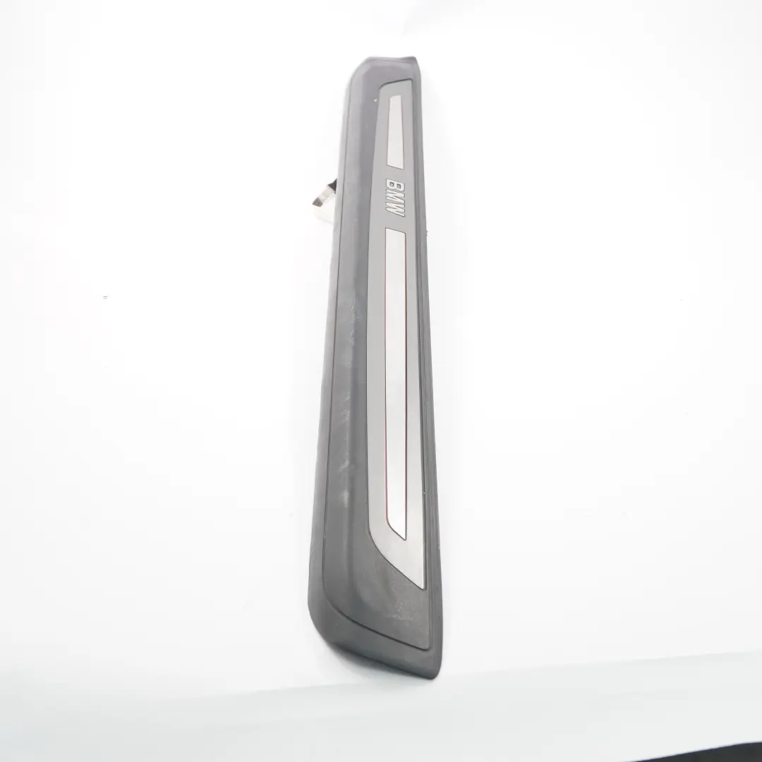 Tapa Tira Derecha Entrada Interior Titan Dunkel para BMW E63 E64 con número de pieza 7079960 BMW E63 E64 Tapa Tira Derecha Entrada Interior Titan Dunkel - SKU 7079960-1 - Número de pieza 7079960