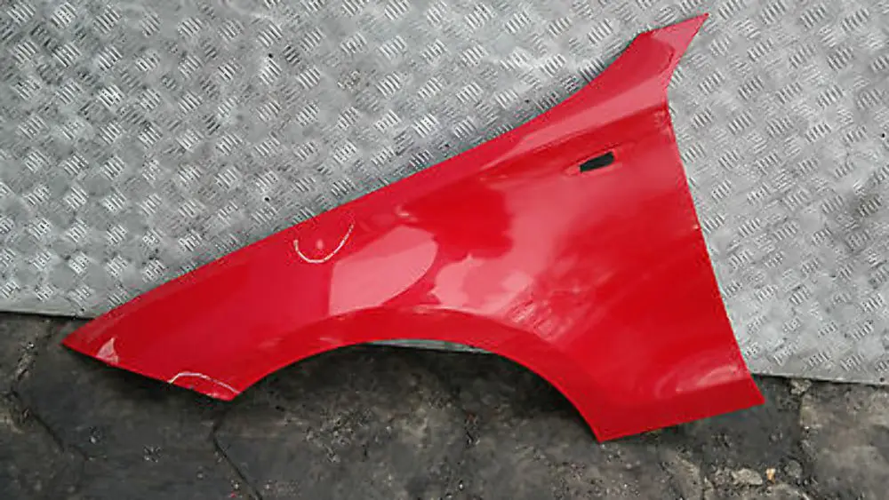 Side panel wing fender front left N/S Japanrot Red to BMW 1 SERIES E81 E87 E87N with Part number 41357133227 BMW 1 SERIES E81 E87 E87N Side panel wing fender front left N/S Japanrot Red - SKU 7133227-JR - Part number 41357133227