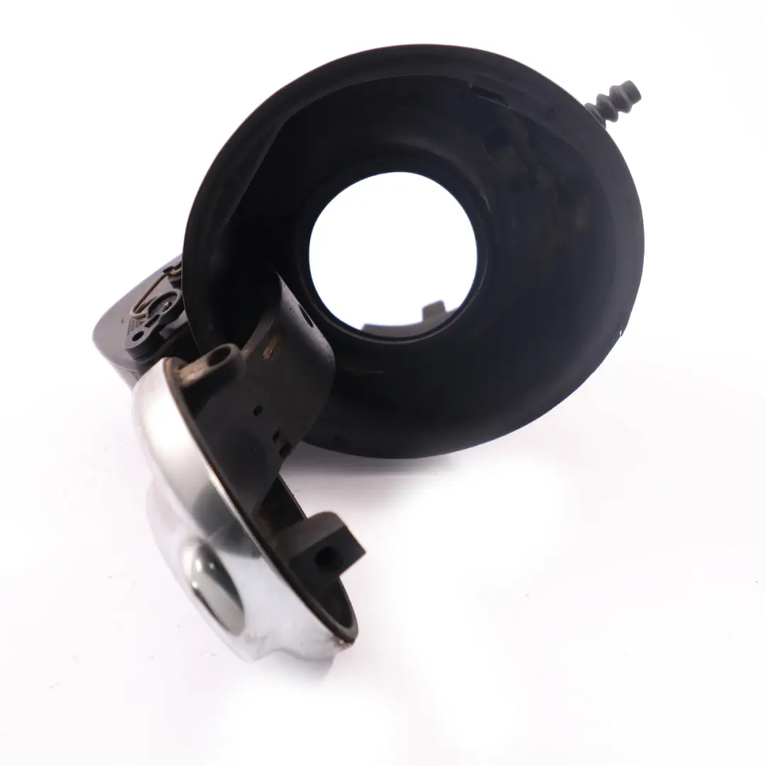 Sportello del Carburante Cromato per MINI Cooper S R55 R56 con numero di parte 7148886 MINI Cooper S R55 R56 Sportello del Carburante Cromato - SKU 7148886 - Numero di parte 7148886
