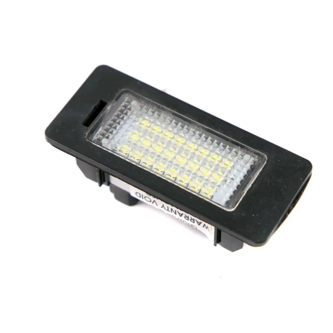 Number Plate Light Reg Lamp to BMW E39 E60 E61 E71 E90 E91 E92 with Part number 7165646 BMW E39 E60 E61 E71 E90 E91 E92 Number Plate Light Reg Lamp - SKU 7165646-2 - Part number 7165646