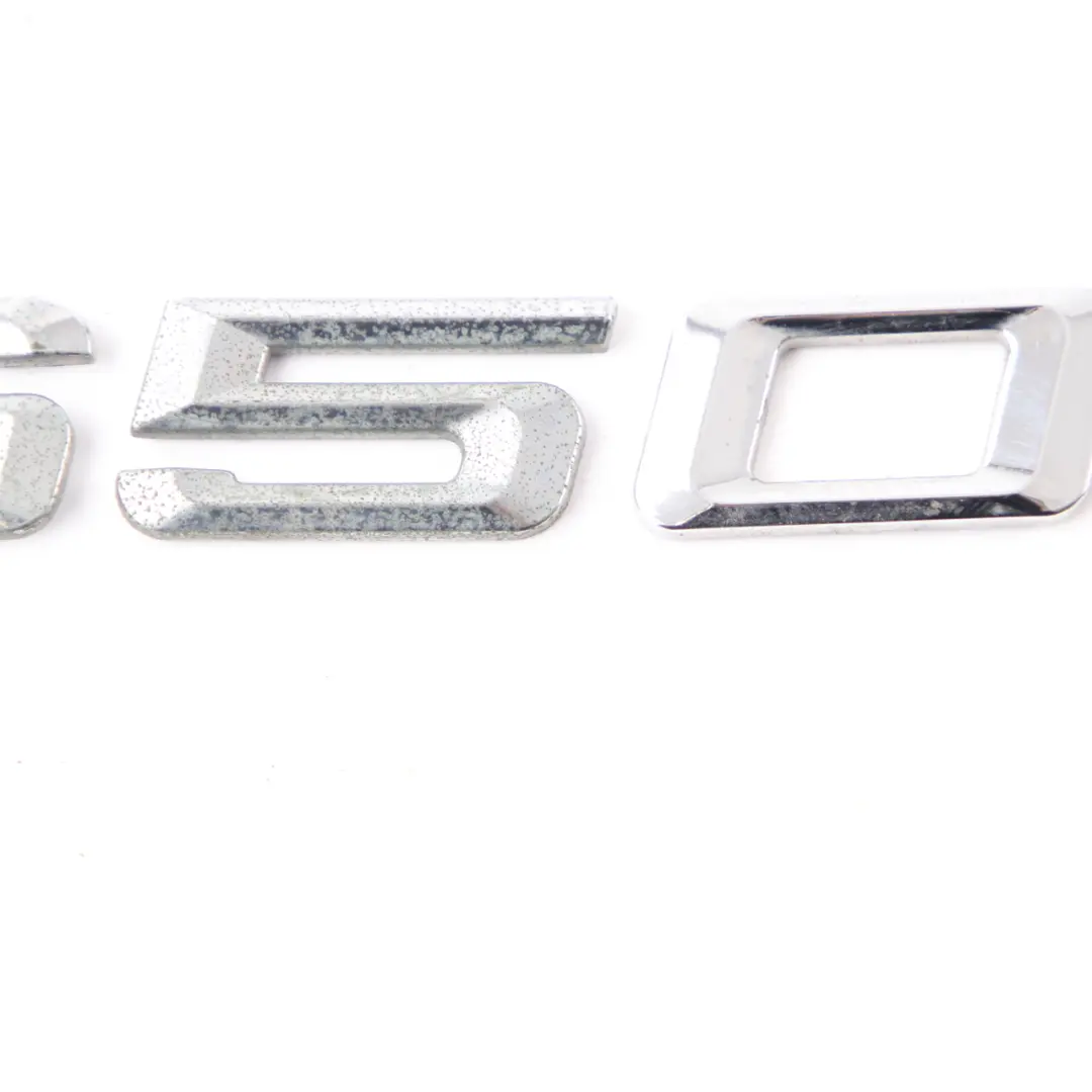 Trunk Emblem BMW E63 E64 Lettering 650i Rear Boot Tailgate Adhered to with Part number 7168175 Trunk Emblem BMW E63 E64 Lettering 650i Rear Boot Tailgate Adhered - SKU 7168175 - Part number 7168175