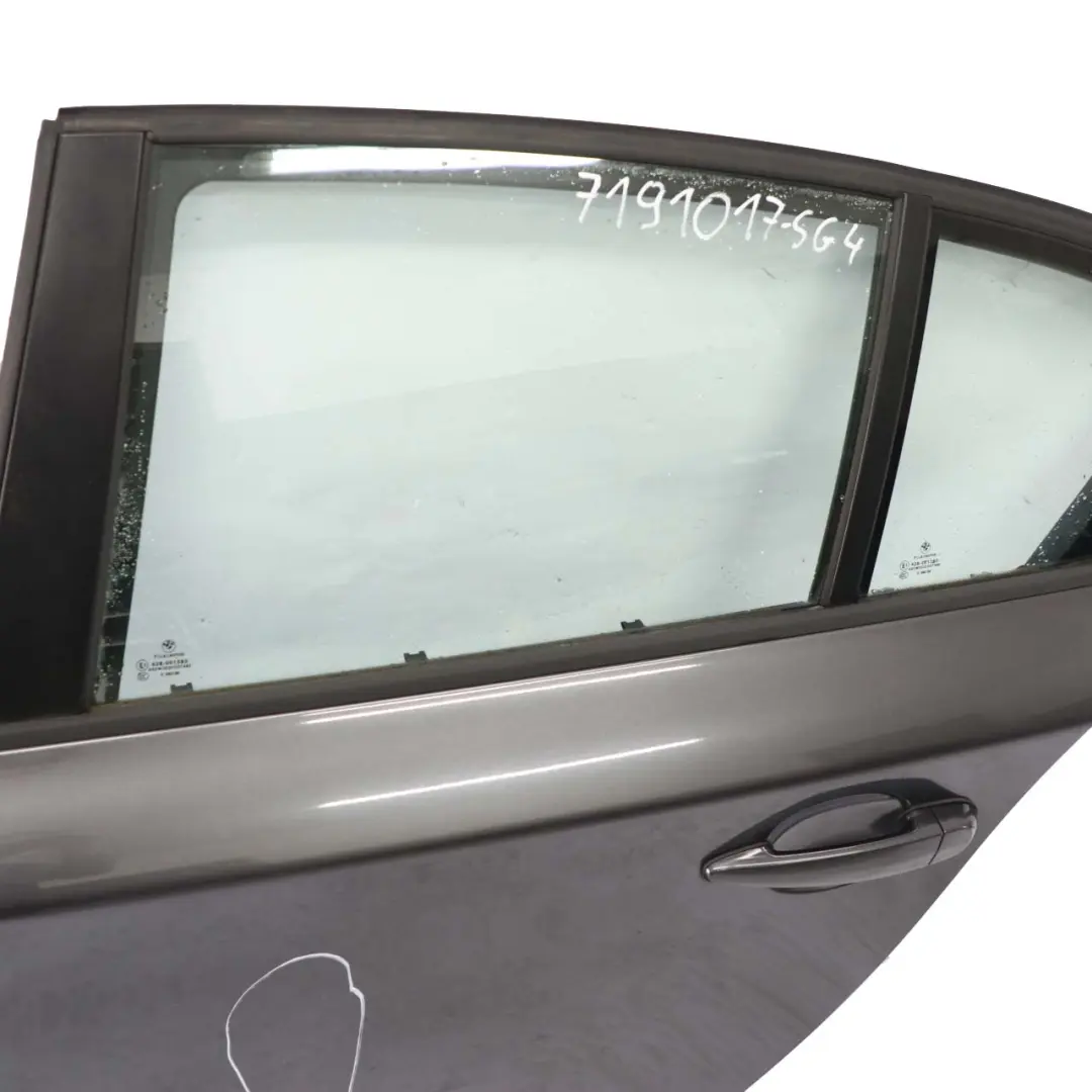 Puerta Trasera Izquierda Sparkling Graphite Metallic - A22 para BMW E87 con número de pieza 7191017 BMW E87 Puerta Trasera Izquierda Sparkling Graphite Metallic - A22 - SKU 7191017-SG4 - Número de pieza 7191017