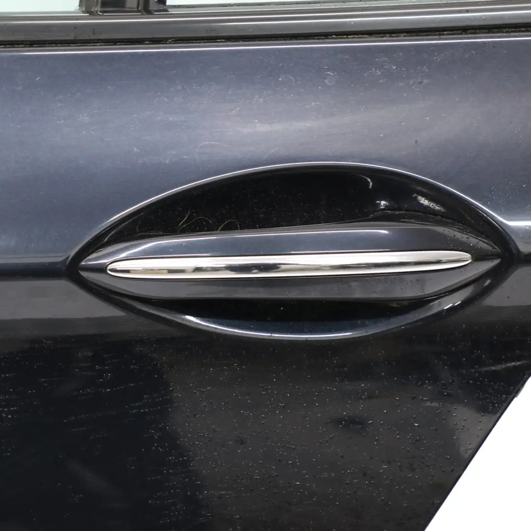 Porta posteriore sinistra Carbonschwarz Nero carbonio - 416 per BMW F11 Touring con numero di parte 7206119 BMW F11 Touring Porta posteriore sinistra Carbonschwarz Nero carbonio - 416 - SKU 7206119-CAR - Numero di parte 7206119