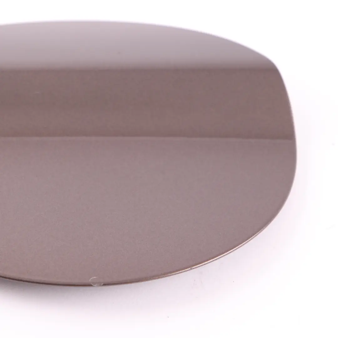 Filler Fill-In Flap Trim Cover Panel Sparkling Bronze Metallic B06 to BMW F20 Fuel with Part number 7270765 BMW F20 Fuel Filler Fill-In Flap Trim Cover Panel Sparkling Bronze Metallic B06 - SKU 7270765-SPB - Part number 7270765