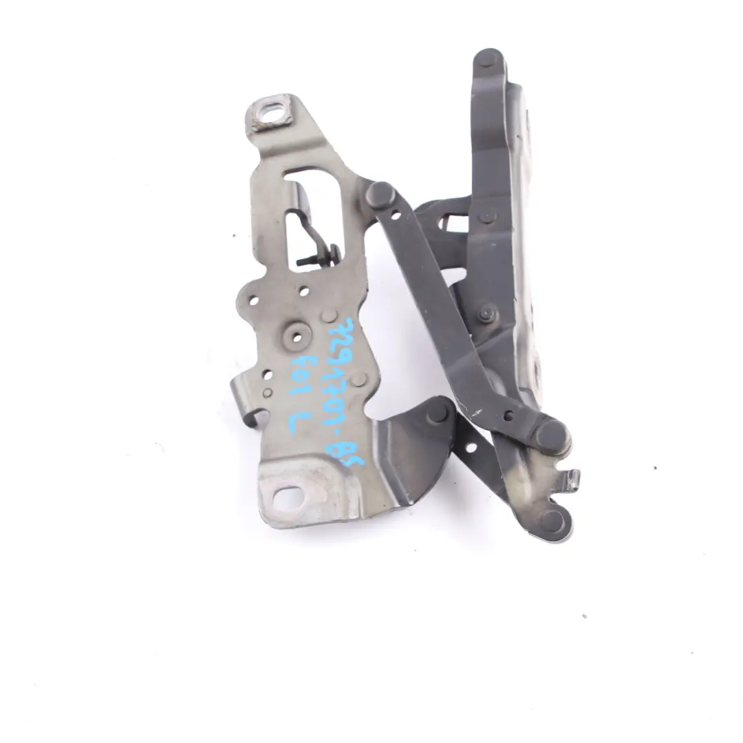 Motor Capó Bisagra Izquierdo Negro Zafiro Metálico 475 7250805 para BMW F01 con número de pieza 7291701 BMW F01 Motor Capó Bisagra Izquierdo Negro Zafiro Metálico 475 7250805 - SKU 7291701-BS - Número de pieza 7291701