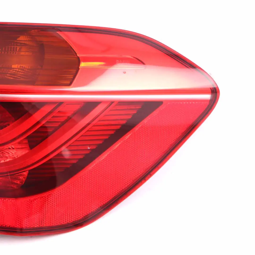 Light BMW F45 Lamp Trim In The Side Panel Right O/S to Rear with Part number 7311030 Rear Light BMW F45 Lamp Trim In The Side Panel Right O/S - SKU 7311030 - Part number 7311030