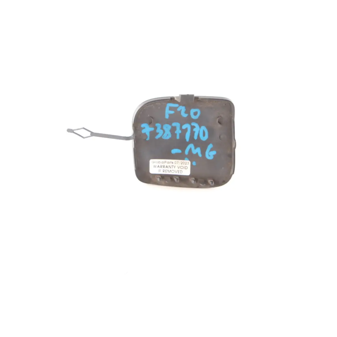 Cubierta Gancho Remolque Aleta Delantero Gris Mineral B39 7371725 para BMW F20 LCI con número de pieza 7387170 BMW F20 LCI Cubierta Gancho Remolque Aleta Delantero Gris Mineral B39 7371725 - SKU 7387170-MG - Número de pieza 7387170