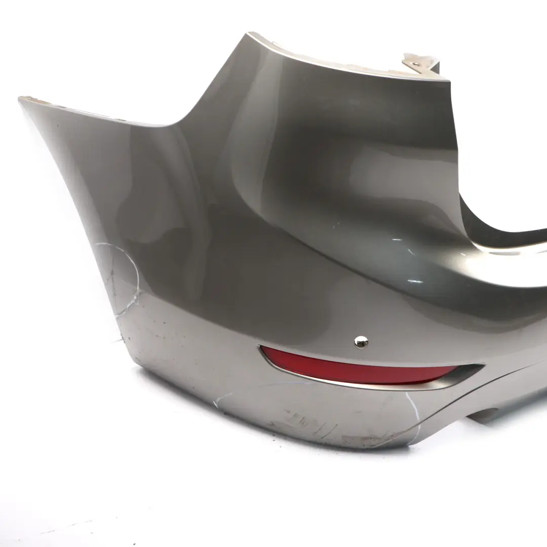 Bumper Rear Trim Panelling Cover PDC Platinum Silver Metallic - C08 to BMW F46 with Part number 7403794 BMW F46 Bumper Rear Trim Panelling Cover PDC Platinum Silver Metallic - C08 - SKU 7403794-PSM - Part number 7403794