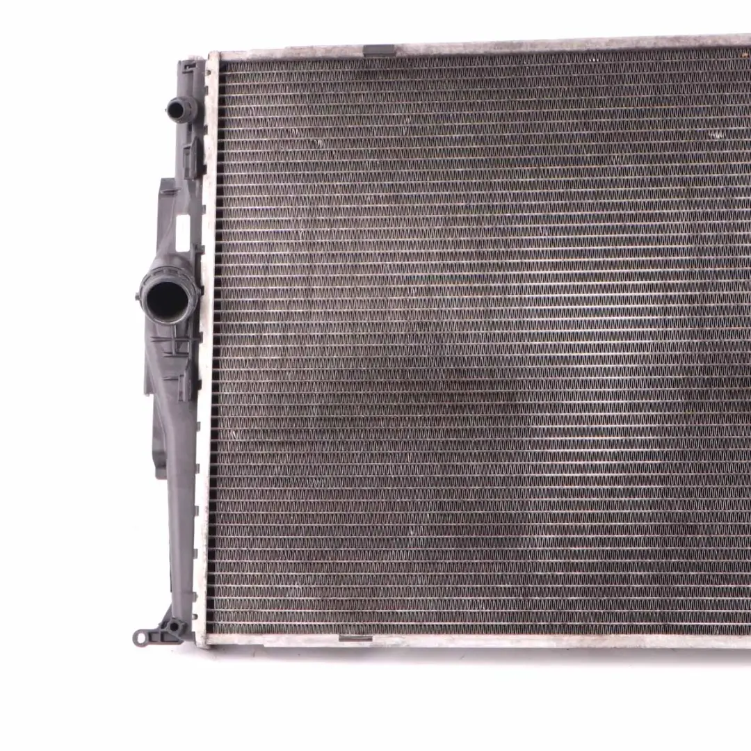 Cooling Radiator Engine Coolant Radiator to BMW E90 E81 E87 E89 E93 325i with Part number 7521048 BMW E90 E81 E87 E89 E93 325i Cooling Radiator Engine Coolant Radiator - SKU 7521048 - Part number 7521048