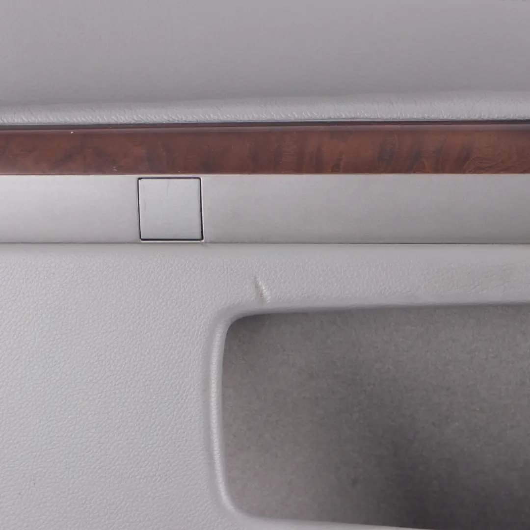 Tarjeta Puerta Delantera Izquierda Revestimiento Cuero Flanell Gris para BMW E65 E66 con número de pieza 9154459 BMW E65 E66 Tarjeta Puerta Delantera Izquierda Revestimiento Cuero Flanell Gris - SKU 9154459 - Número de pieza 9154459