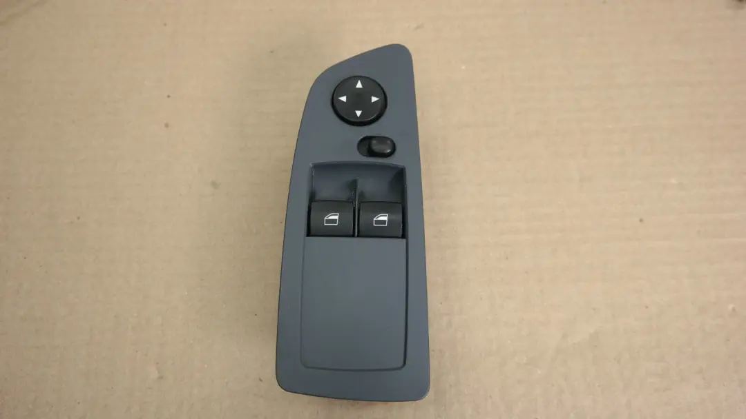 Switch window lifter driver's side grau grey to BMW 1 Series E87 with Part number 6970194 BMW 1 Series E87 Switch window lifter driver's side grau grey - SKU 9217267 - Part number 6970194