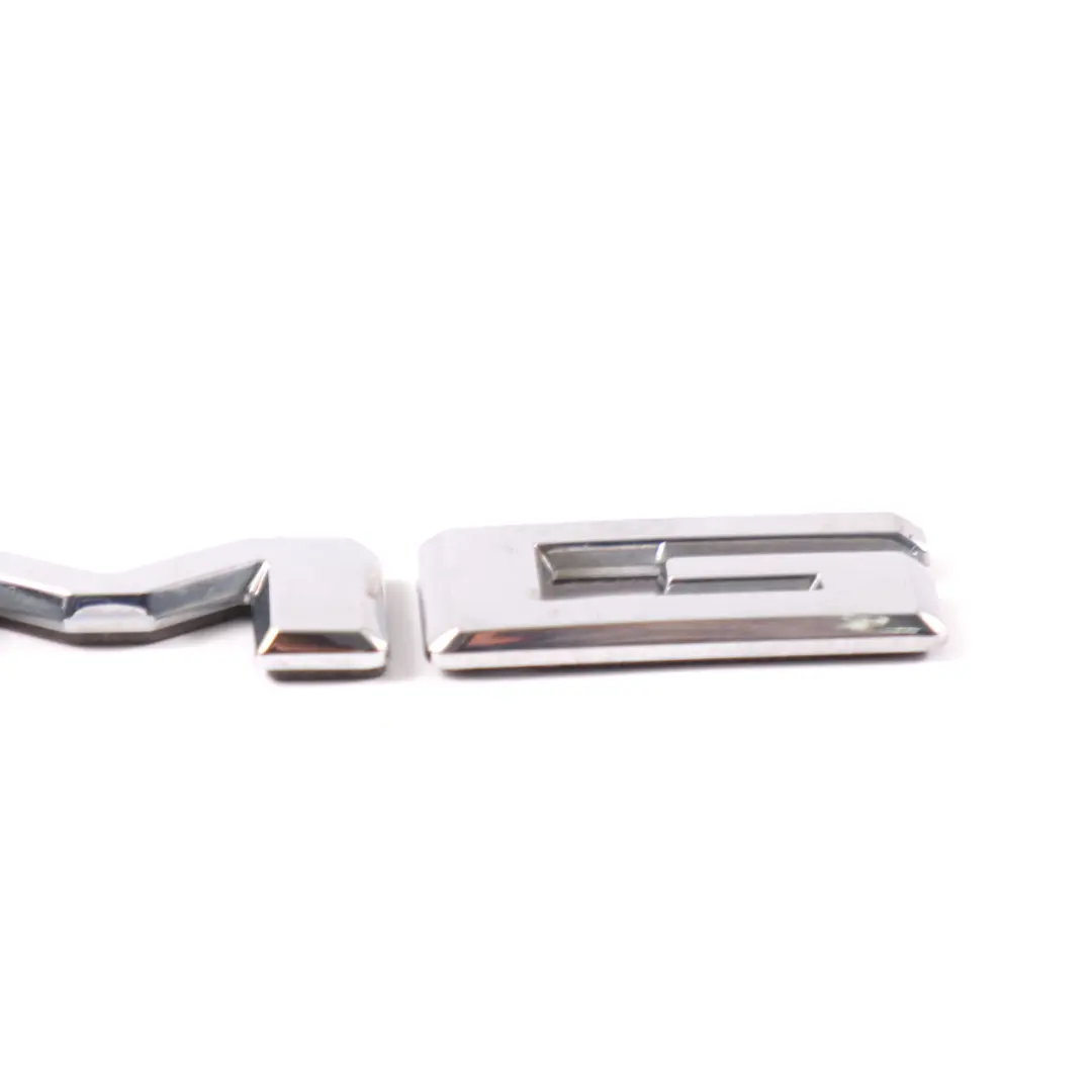 Mercedes C117 Emblemat Znaczek Tylny Logo AMG - SKU A1178173900 - Numer Części A1178173900