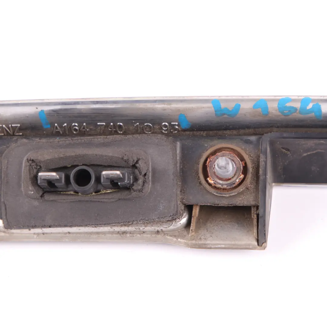 Handle Mount Number Plate Light Cover to Mercedes ML W164 Tailgate with Part number A1647401093 Mercedes ML W164 Tailgate Handle Mount Number Plate Light Cover - SKU A1647401093 - Part number A1647401093