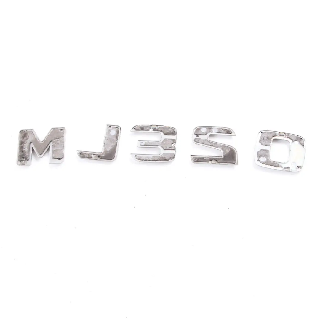 Mercedes ML W164 ML 320 Emblème coffre arrière Adhered Badge Logo - SKU A1648170915 - Numéro de pièce A1648170915