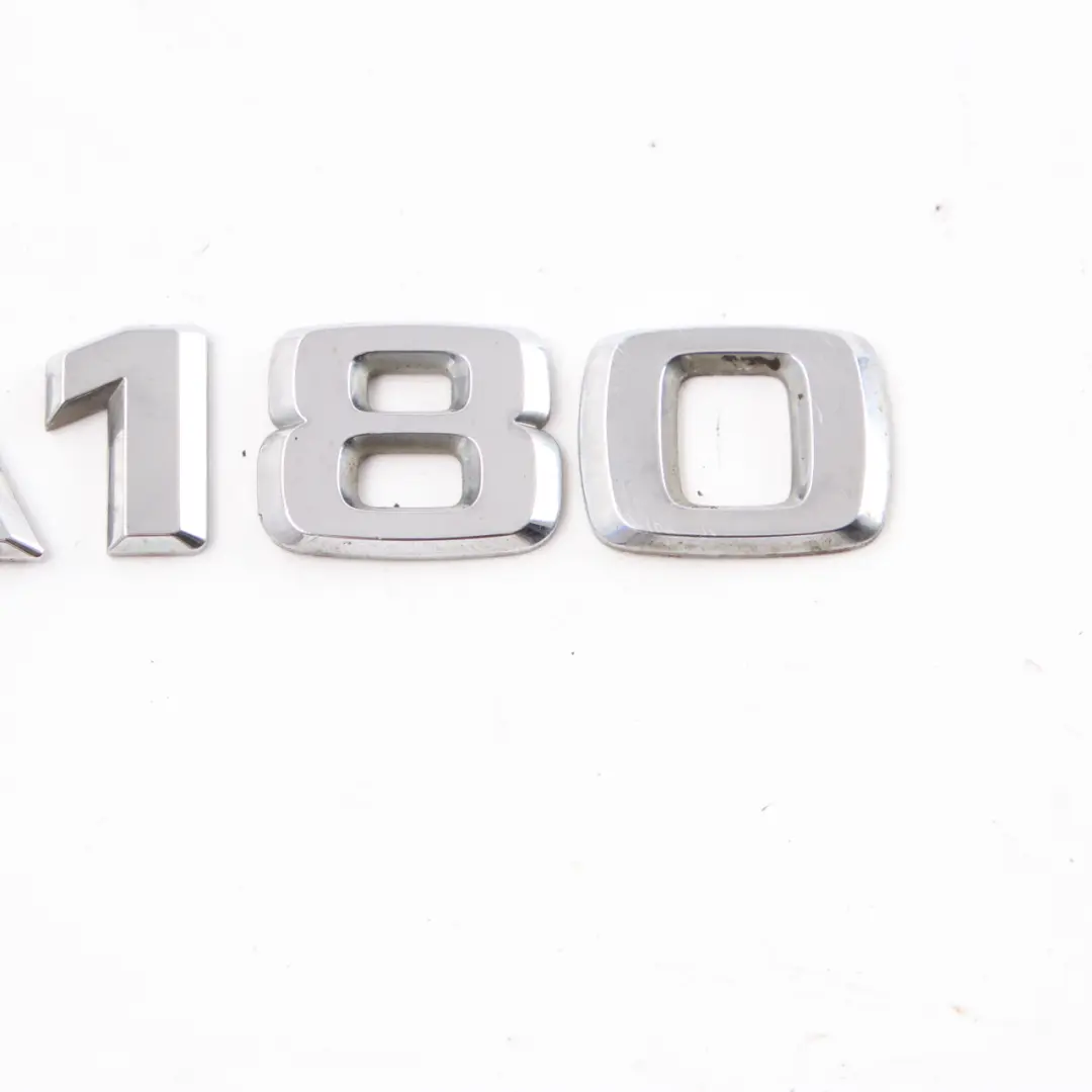 Mercedes W169 Rear Trunk Tailgate Adhered Emblem Lettering A180 - SKU A1698170815 - Part number A1698170815
