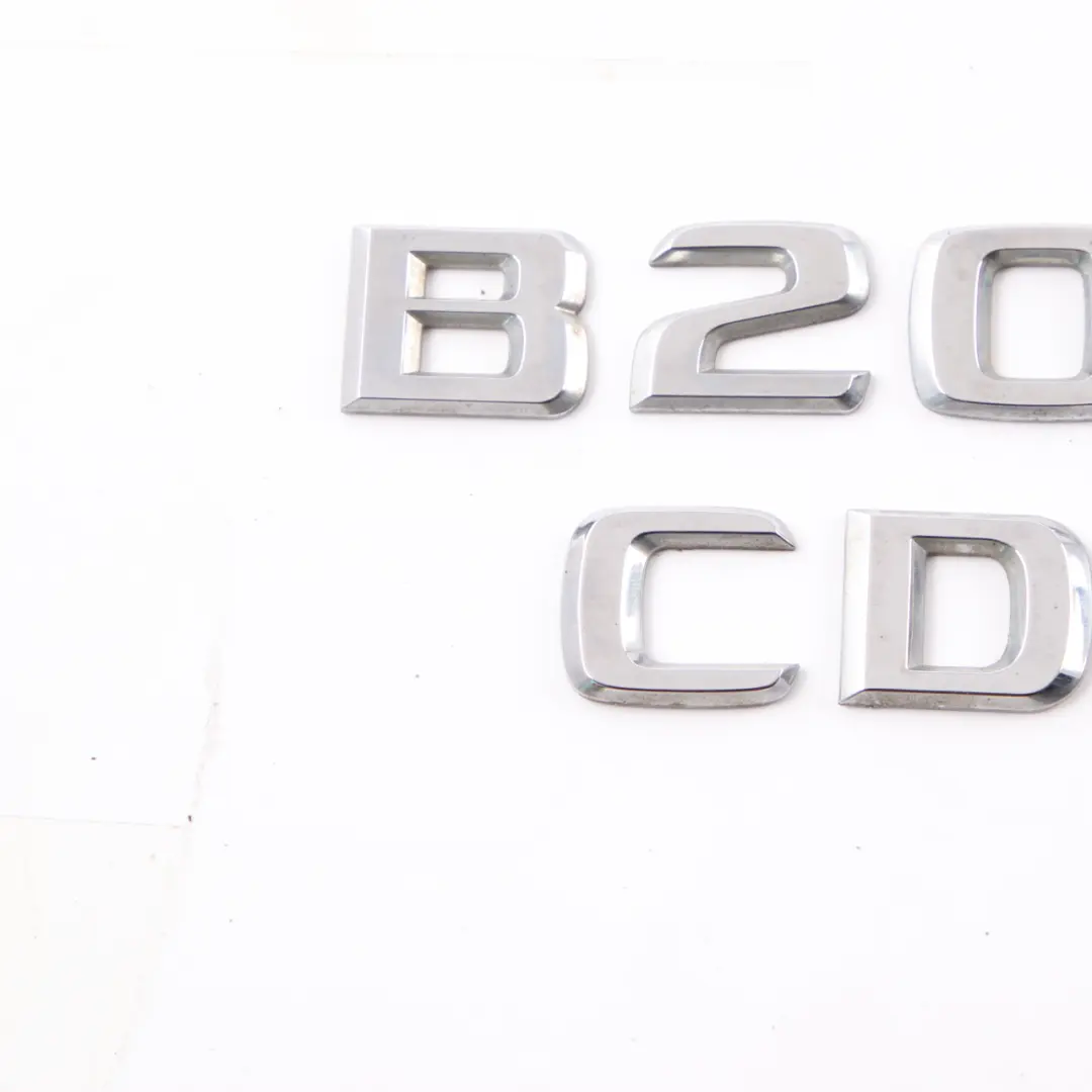 Schriftzug Emblem B200 CDI hinten Kofferraum Heckklappe aufgeklebt für Mercedes W245 mit Teilenummer A1698171315 Mercedes W245 Schriftzug Emblem B200 CDI hinten Kofferraum Heckklappe aufgeklebt - SKU A1698171315-1 - Teilenummer A1698171315