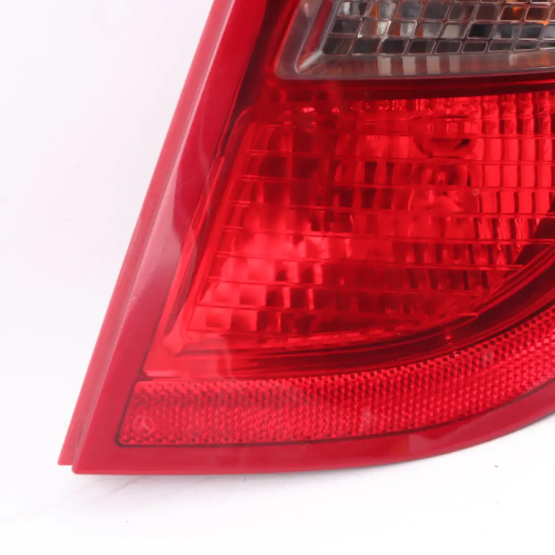 Right O/S Tail Light Lamp Side Panel to Mercedes W169 Rear with Part number A1698203064 Mercedes W169 Rear Right O/S Tail Light Lamp Side Panel - SKU A1698203064-1 - Part number A1698203064