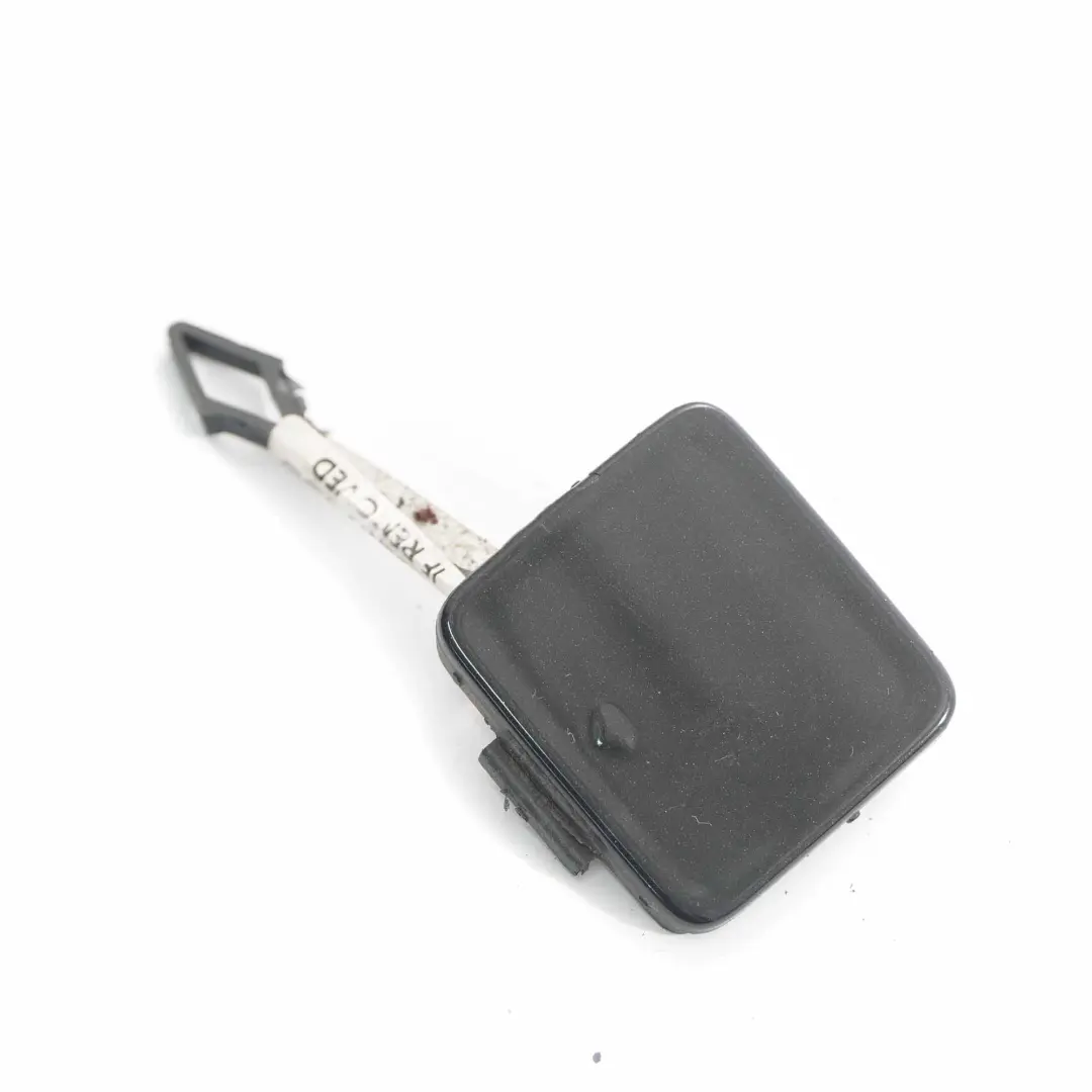 Bumper Flap Towing Eye Cover Kosmos Black - 191 to Mercedes W169 Rear with Part number A1698853322 Mercedes W169 Rear Bumper Flap Towing Eye Cover Kosmos Black - 191 - SKU A1698853322-KB - Part number A1698853322