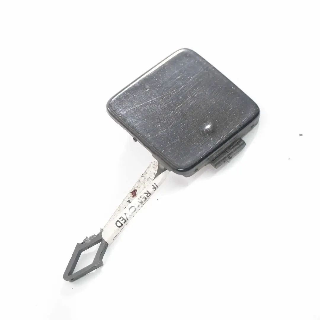 Bumper Flap Towing Eye Cover Kosmos Black - 191 to Mercedes W169 Rear with Part number A1698853322 Mercedes W169 Rear Bumper Flap Towing Eye Cover Kosmos Black - 191 - SKU A1698853322-KB - Part number A1698853322