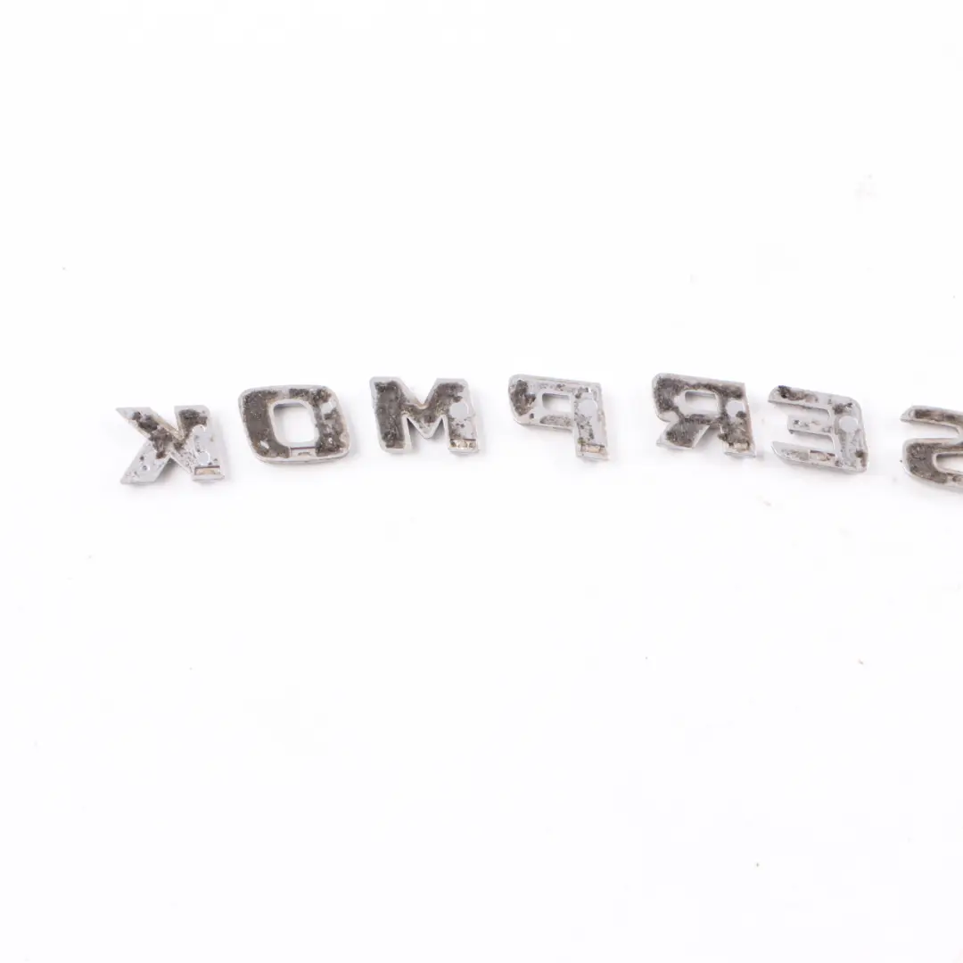 Fender Emblema Lettering Frente Wing Panel Logo Kompressor para Mercedes SLK R171 con número de pieza A1718170515 Mercedes SLK R171 Fender Emblema Lettering Frente Wing Panel Logo Kompressor - SKU A1718170515 - Número de pieza A1718170515