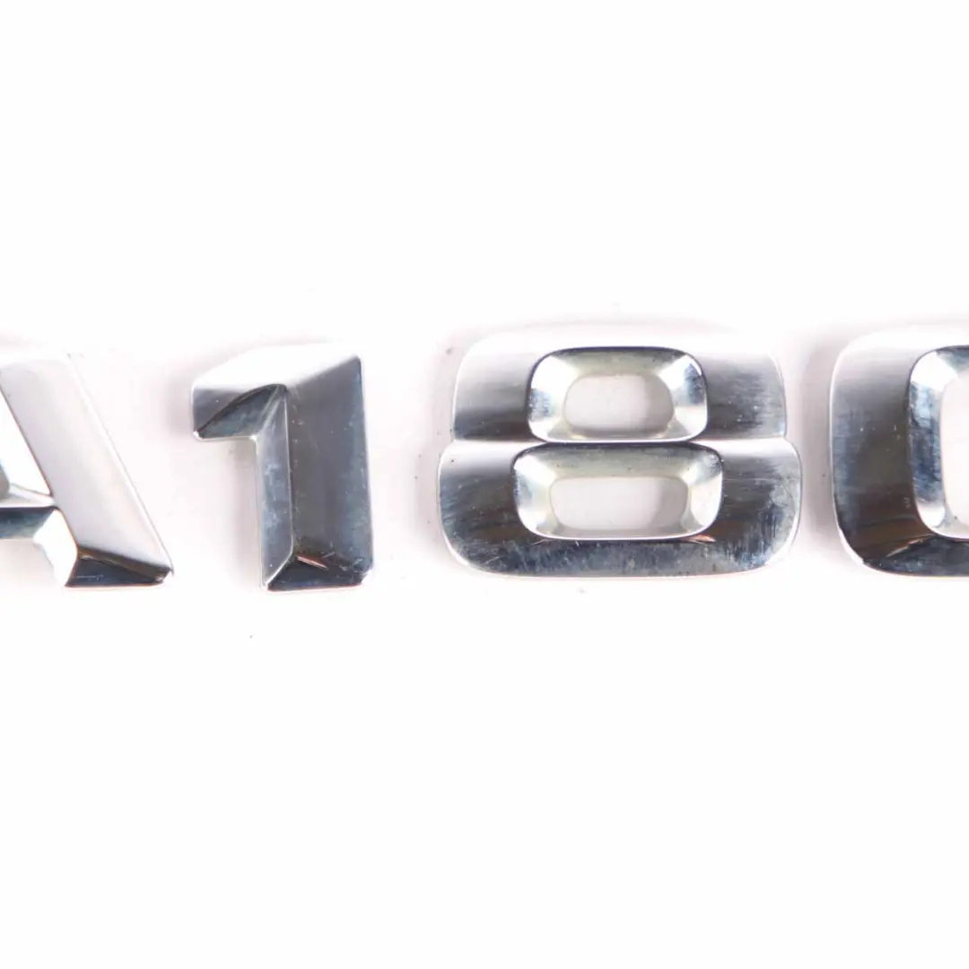 Trunk Tailgate Adhered Emblem Lettering A180 to Mercedes W176 Rear with Part number A1768170515 Mercedes W176 Rear Trunk Tailgate Adhered Emblem Lettering A180 - SKU A1768170515 - Part number A1768170515