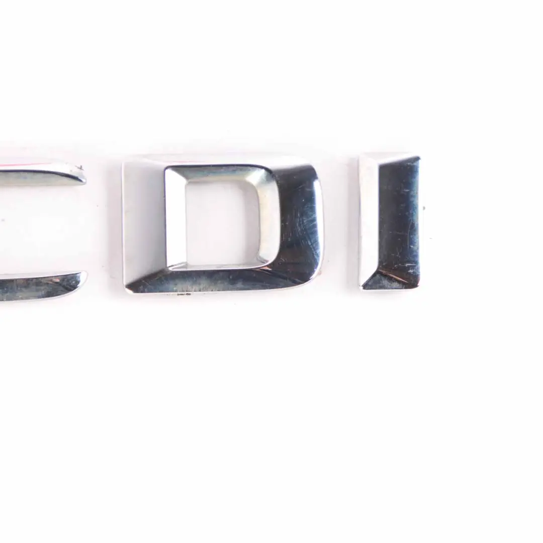 Emblemat Napis CDI Klapy Bagażnika do Mercedes W176 o numerze A1768171015 Mercedes W176 Emblemat Napis CDI Klapy Bagażnika - SKU A1768171015 - Numer Części A1768171015