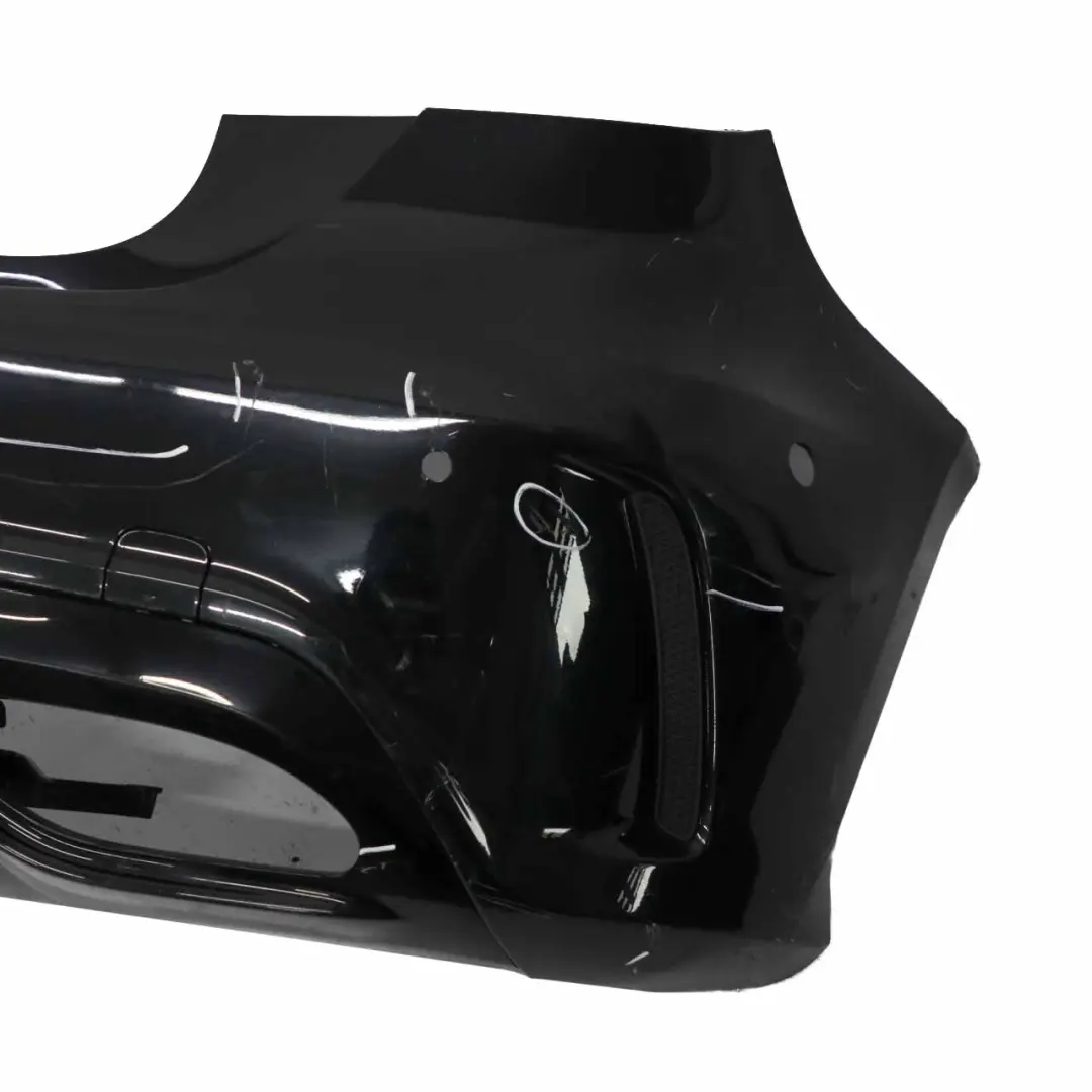 Bumper Rear Trim Panel Cover AMG Kosmos Cosmic Black Metallic 191 to Mercedes W176 with Part number A1768800001 Mercedes W176 Bumper Rear Trim Panel Cover AMG Kosmos Cosmic Black Metallic 191 - SKU A1768800001-KB - Part number A1768800001