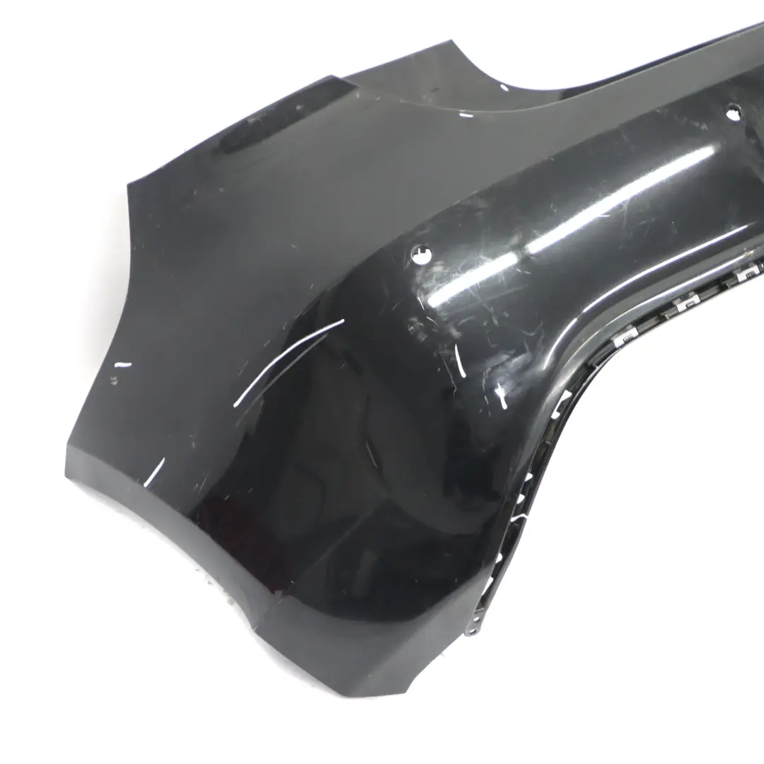 Embellecedor Parachoques Trasero Mercedes W176 Cosmic Black Metallic - 191 para con número de pieza A1768800540 Embellecedor Parachoques Trasero Mercedes W176 Cosmic Black Metallic - 191 - SKU A1768800540-KB - Número de pieza A1768800540